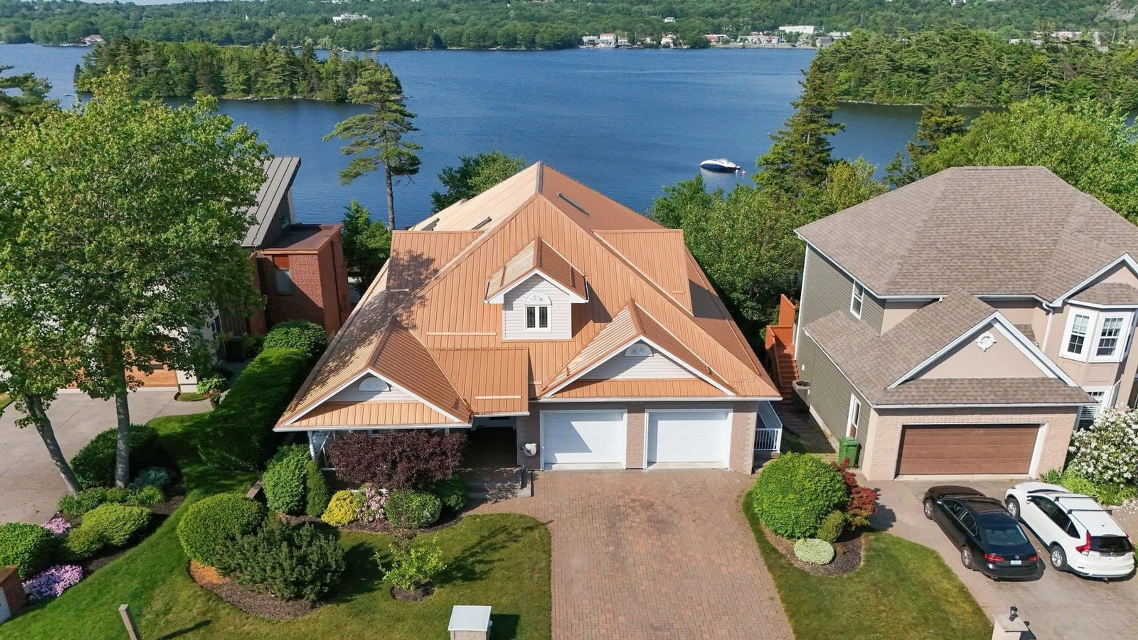 A pic from outside/outdoor area/front of a property/back of a property/a pic from drone, water/lake/river/ocean view for 35 Lakeshore Park Terr, Dartmouth Nova Scotia B3A 4Z4