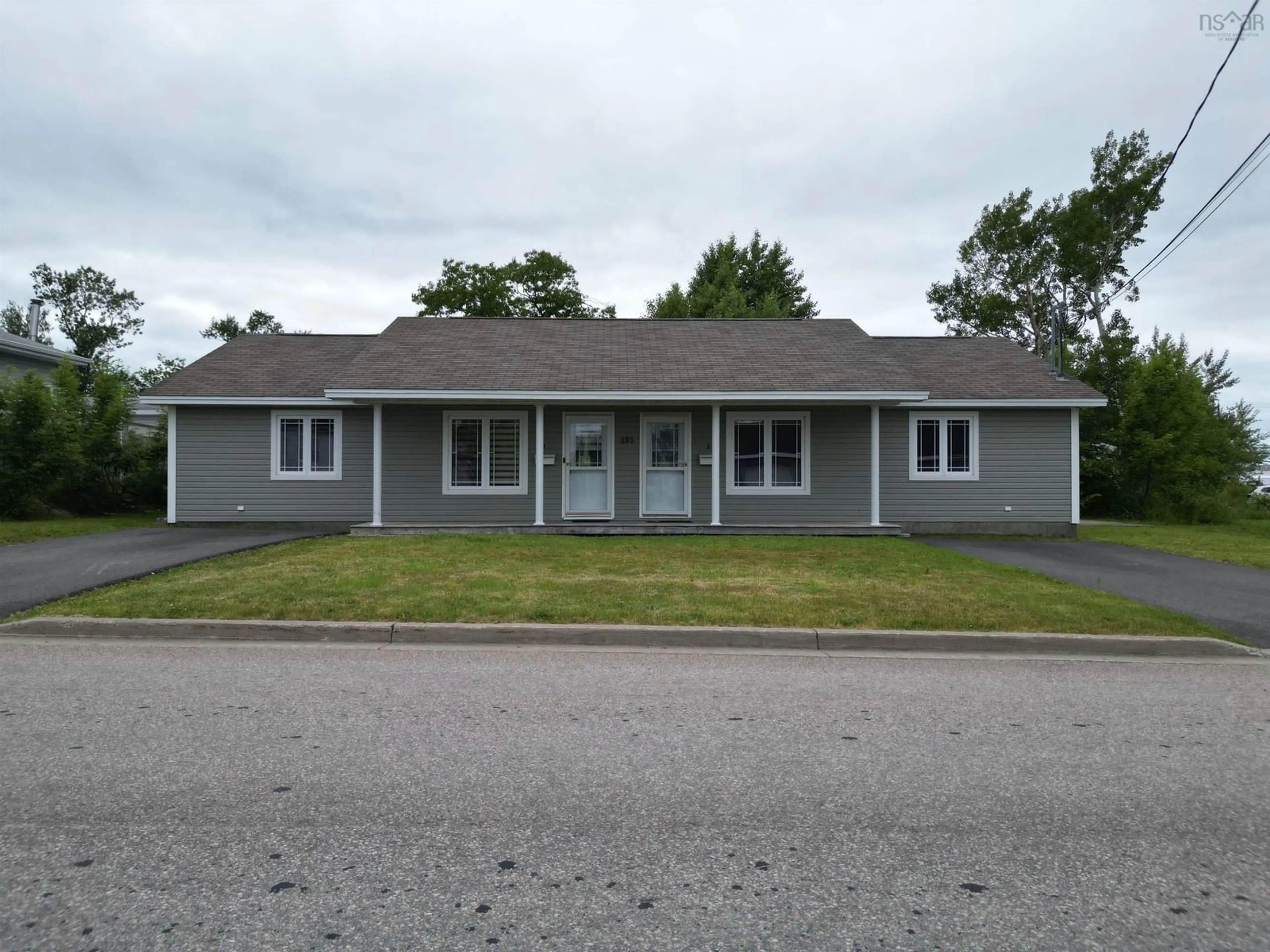 Home with vinyl exterior material, street for 493 St Peters Road, Sydney Nova Scotia B1P 4S2