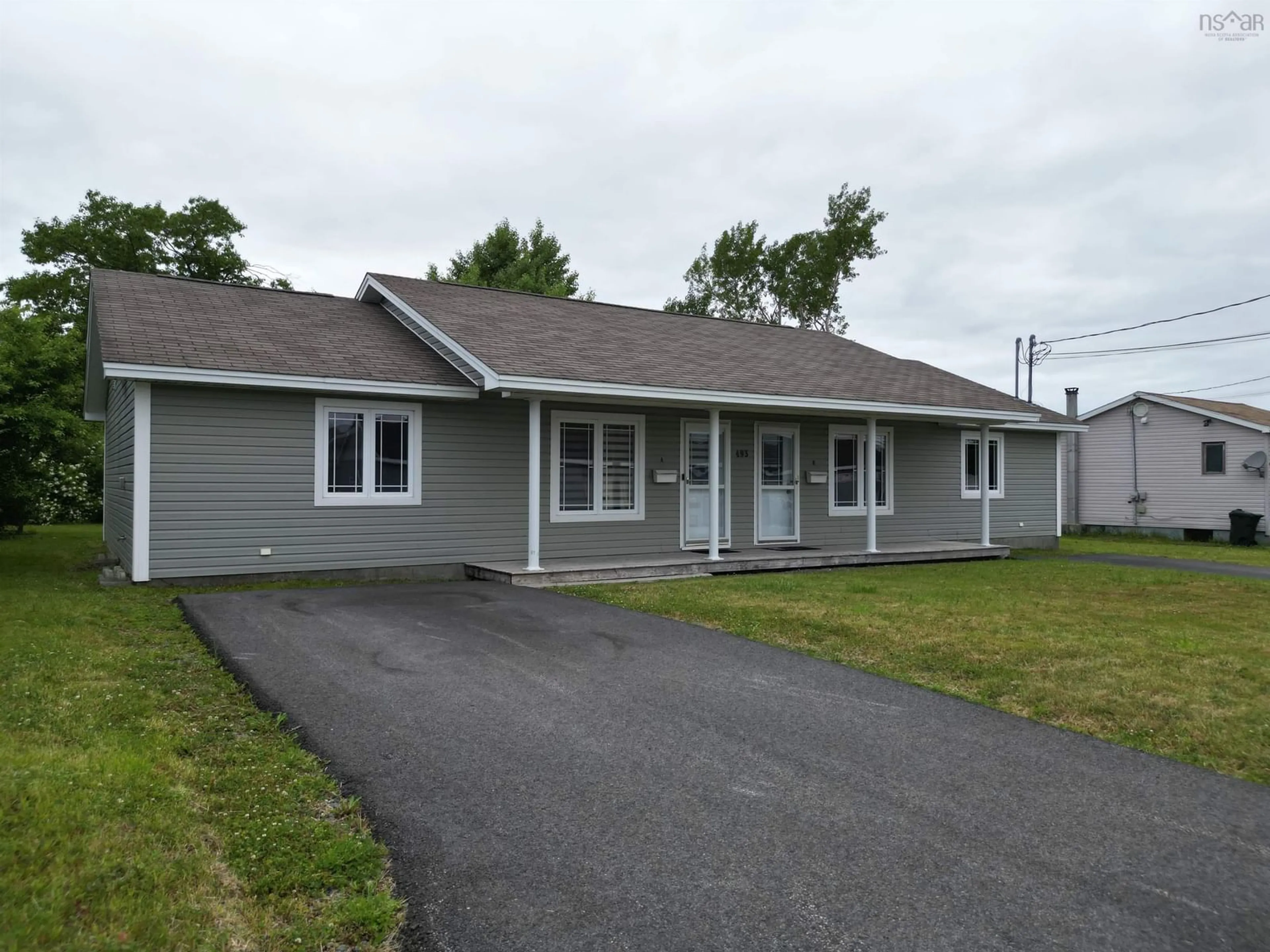 Home with vinyl exterior material, street for 493 St Peters Road, Sydney Nova Scotia B1P 4S2