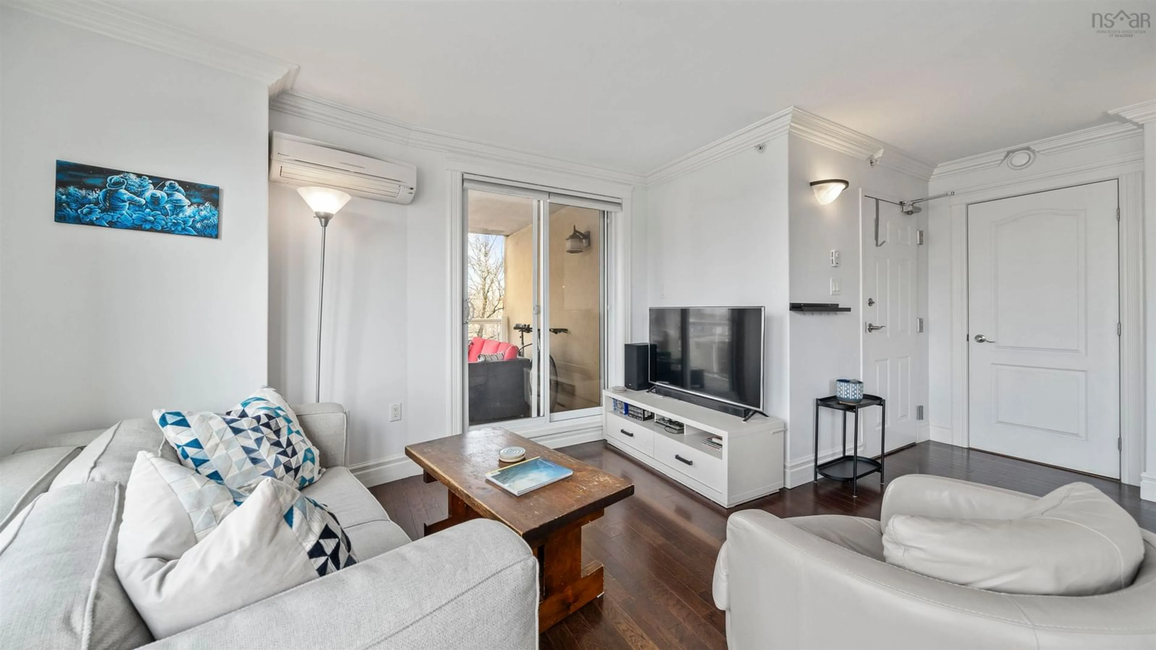 Living room with furniture, wood/laminate floor for 5689 Cunard St #403, Halifax Peninsula Nova Scotia B3K 1C7