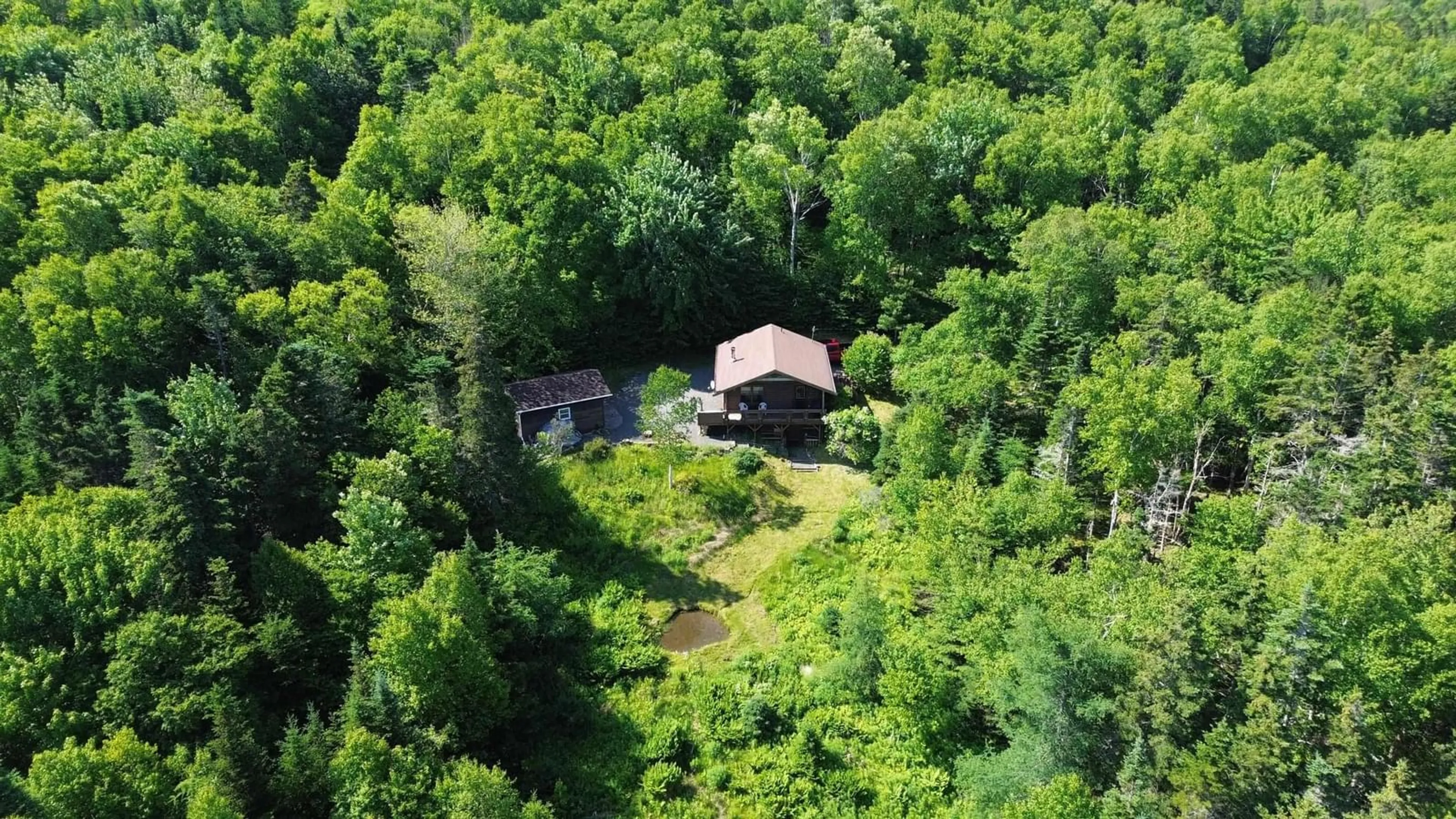 A pic from outside/outdoor area/front of a property/back of a property/a pic from drone, forest/trees view for 46 Bavaria Lane, The Points West Bay Nova Scotia B0E 3B0