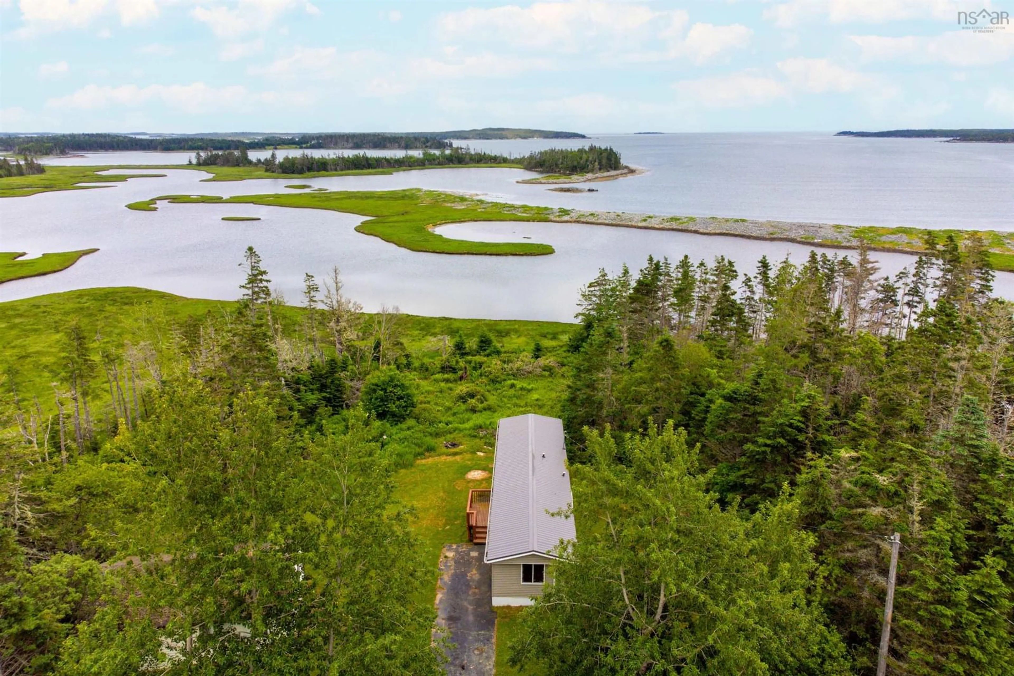 A pic from outside/outdoor area/front of a property/back of a property/a pic from drone, water/lake/river/ocean view for 2403 West Ship Harbour Rd, Owls Head Nova Scotia B0J 2L0