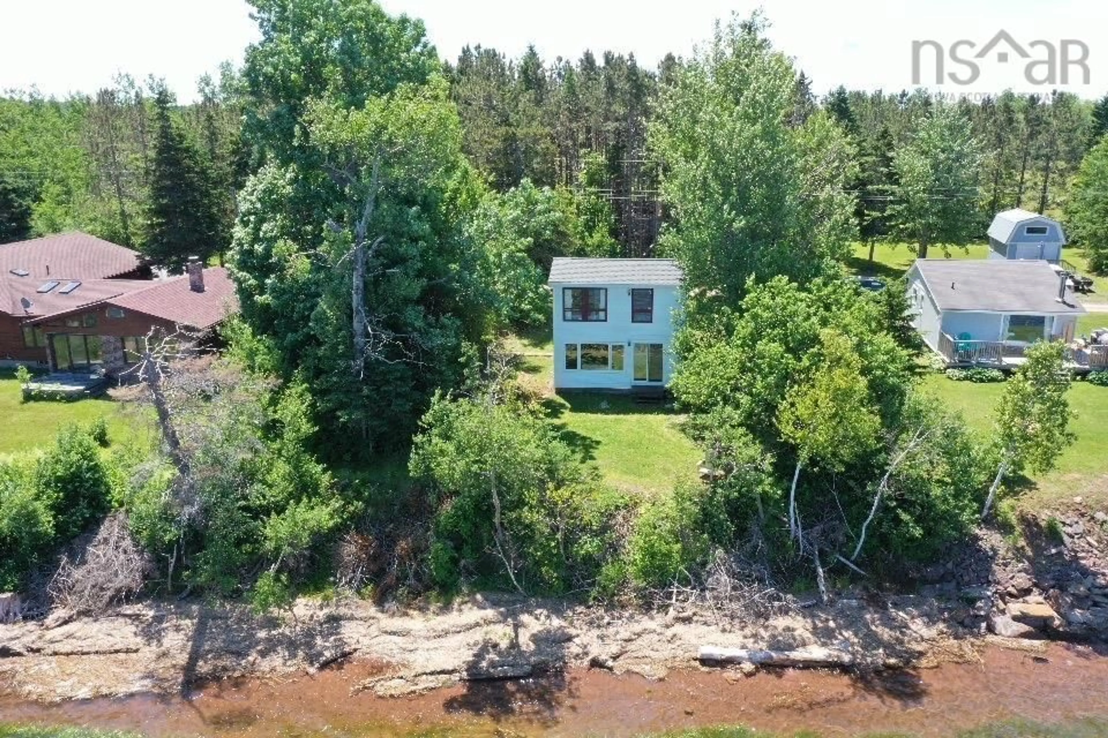 A pic from outside/outdoor area/front of a property/back of a property/a pic from drone, water/lake/river/ocean view for 543 Bridgeview Lane, Port Philip Nova Scotia B0K 1K0