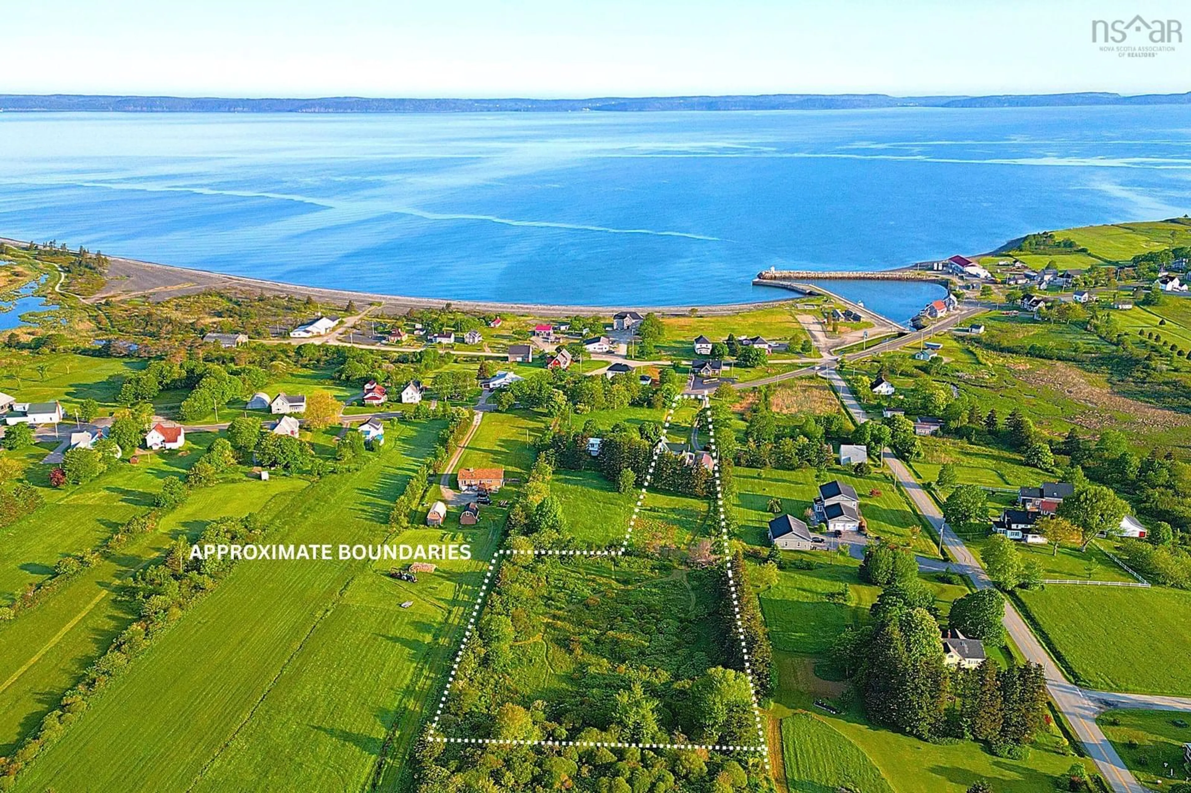 A pic from outside/outdoor area/front of a property/back of a property/a pic from drone, water/lake/river/ocean view for 3208 Highway 1, Belliveaus Cove Nova Scotia B0W 1J0