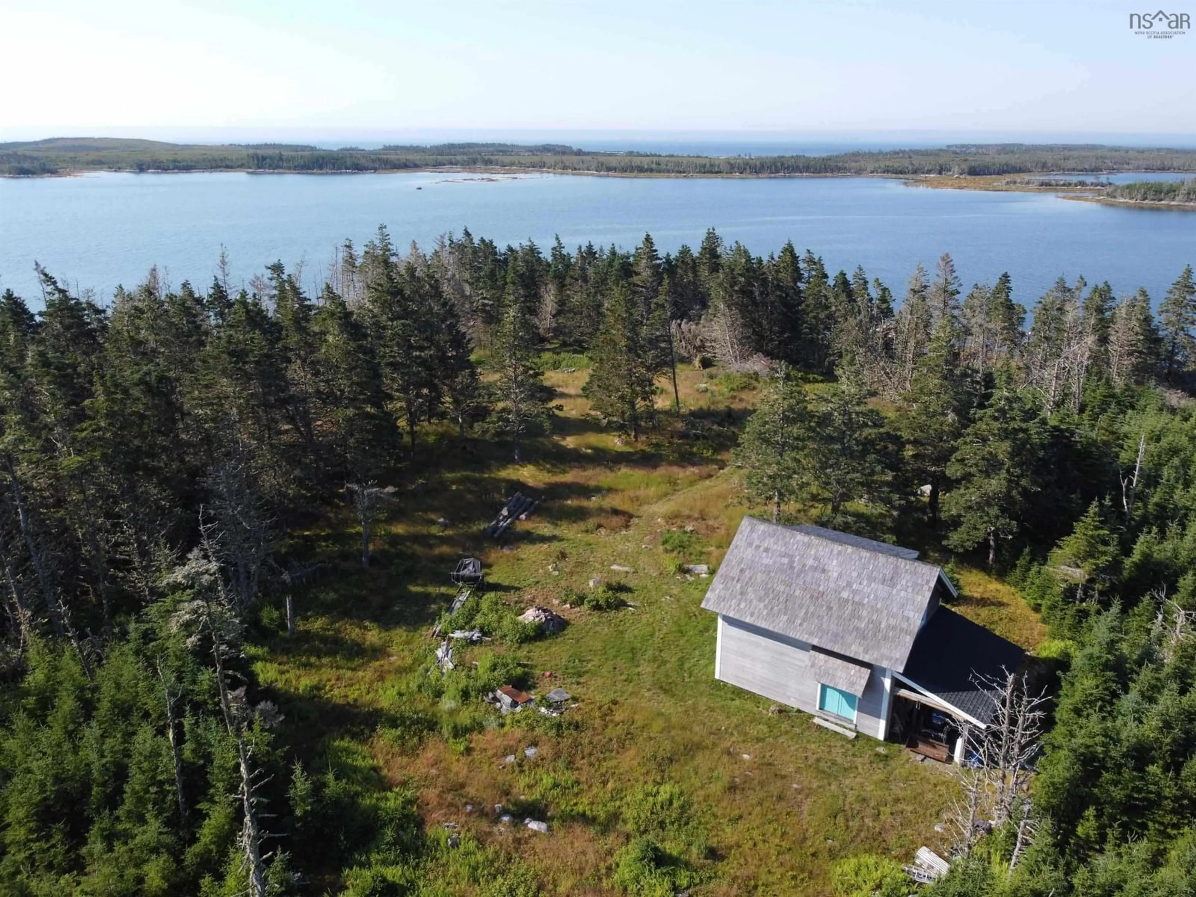 A pic from outside/outdoor area/front of a property/back of a property/a pic from drone, water/lake/river/ocean view for Turners Island, Marie Joseph Nova Scotia B0J 2G0