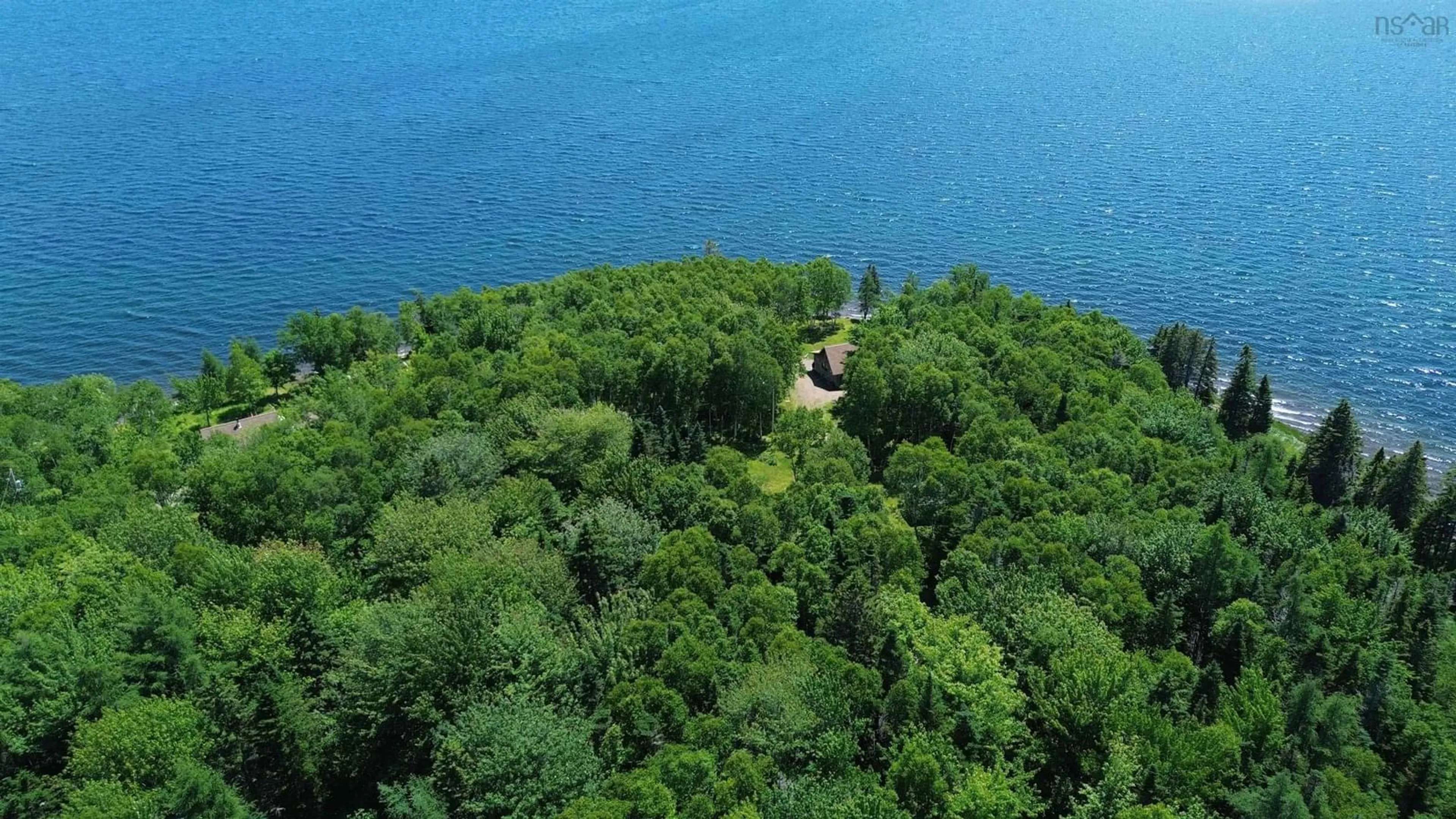 A pic from outside/outdoor area/front of a property/back of a property/a pic from drone, water/lake/river/ocean view for 64 Birch Pond Lane, West Bay Marshes Nova Scotia B0E 2Y0