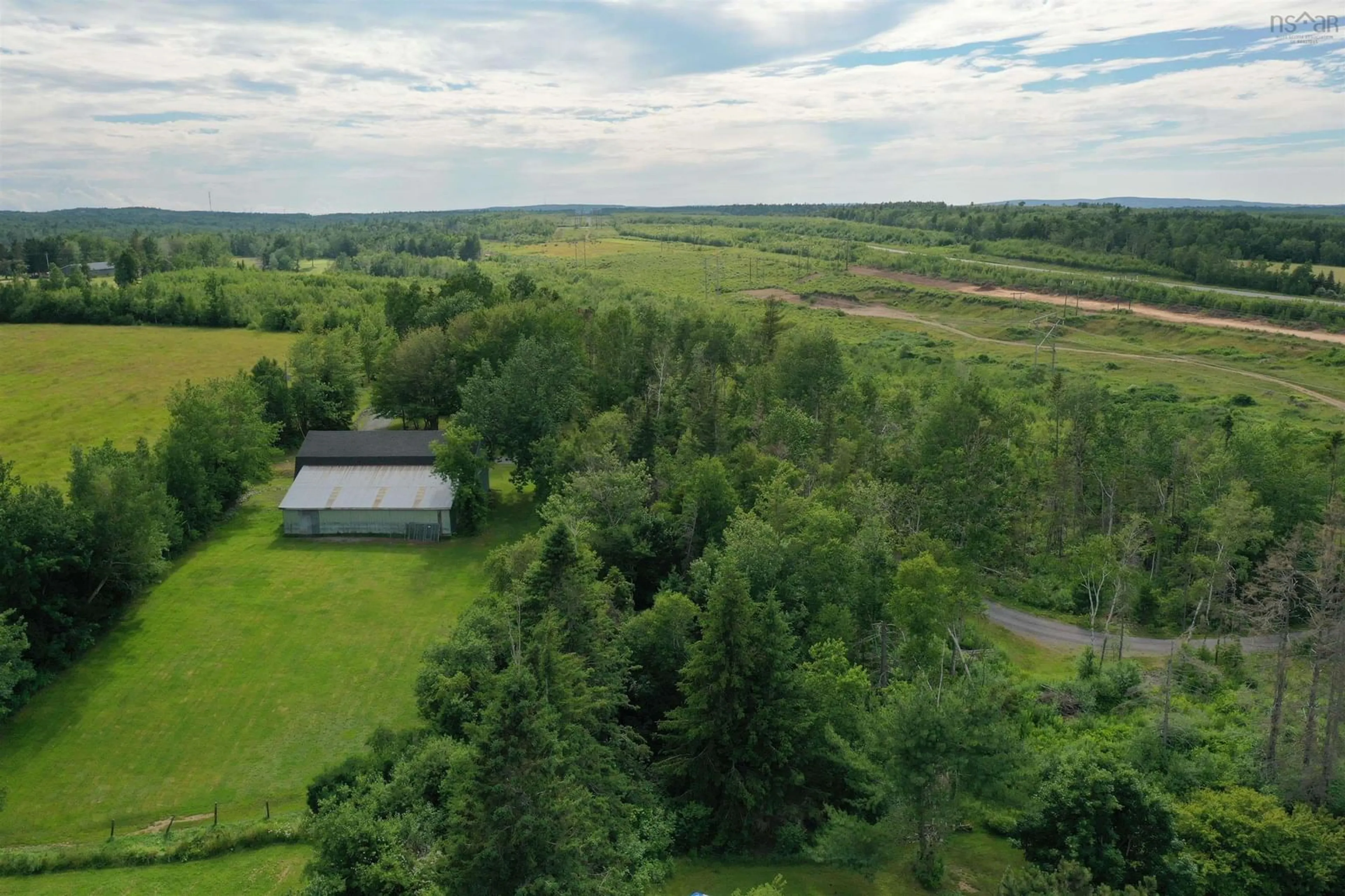A pic from outside/outdoor area/front of a property/back of a property/a pic from drone, forest/trees view for 56 Blue Haven Lane, Abercrombie Nova Scotia B2H 5C6