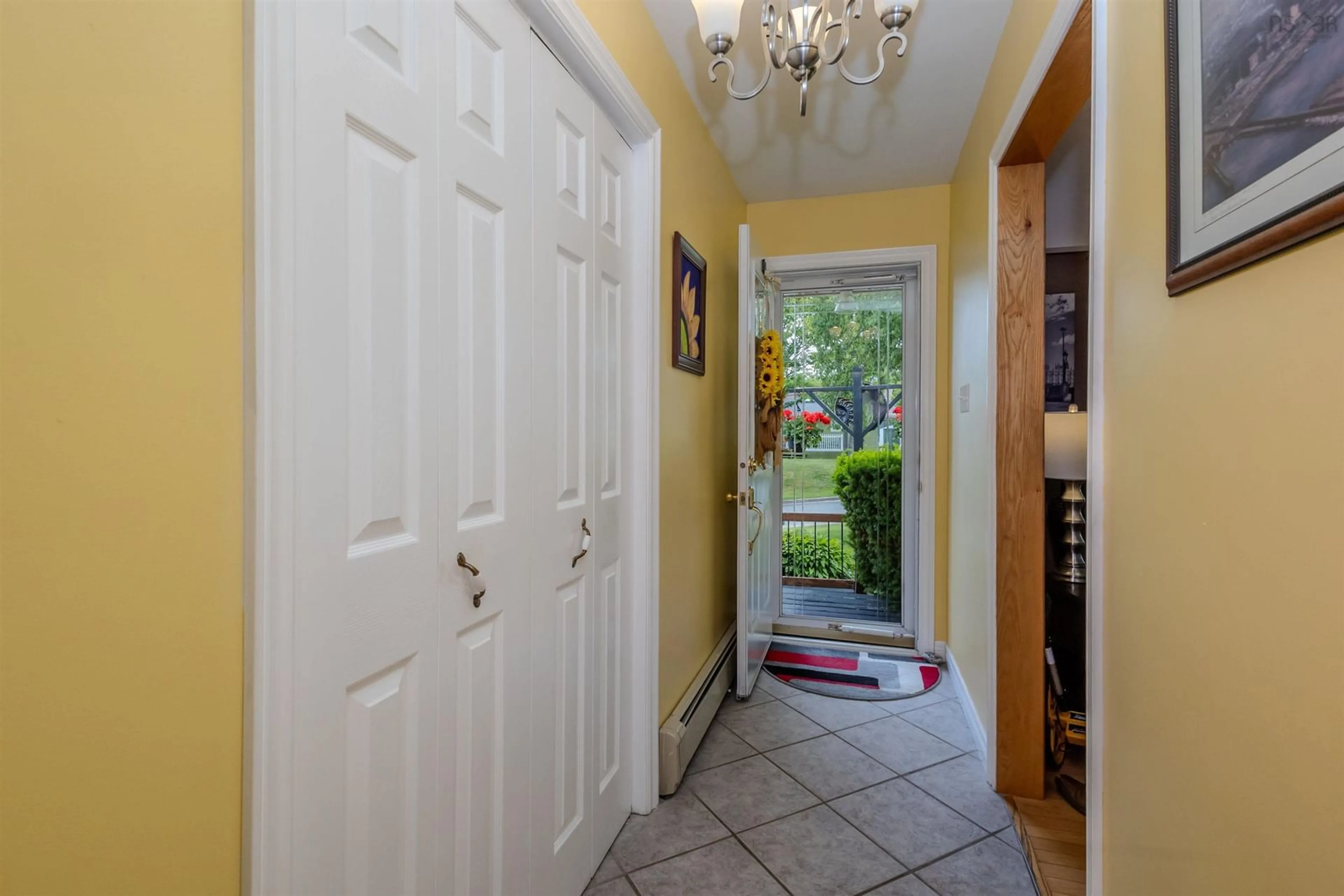 Indoor foyer for 91 Common St, Sydney Nova Scotia B1P 3L3