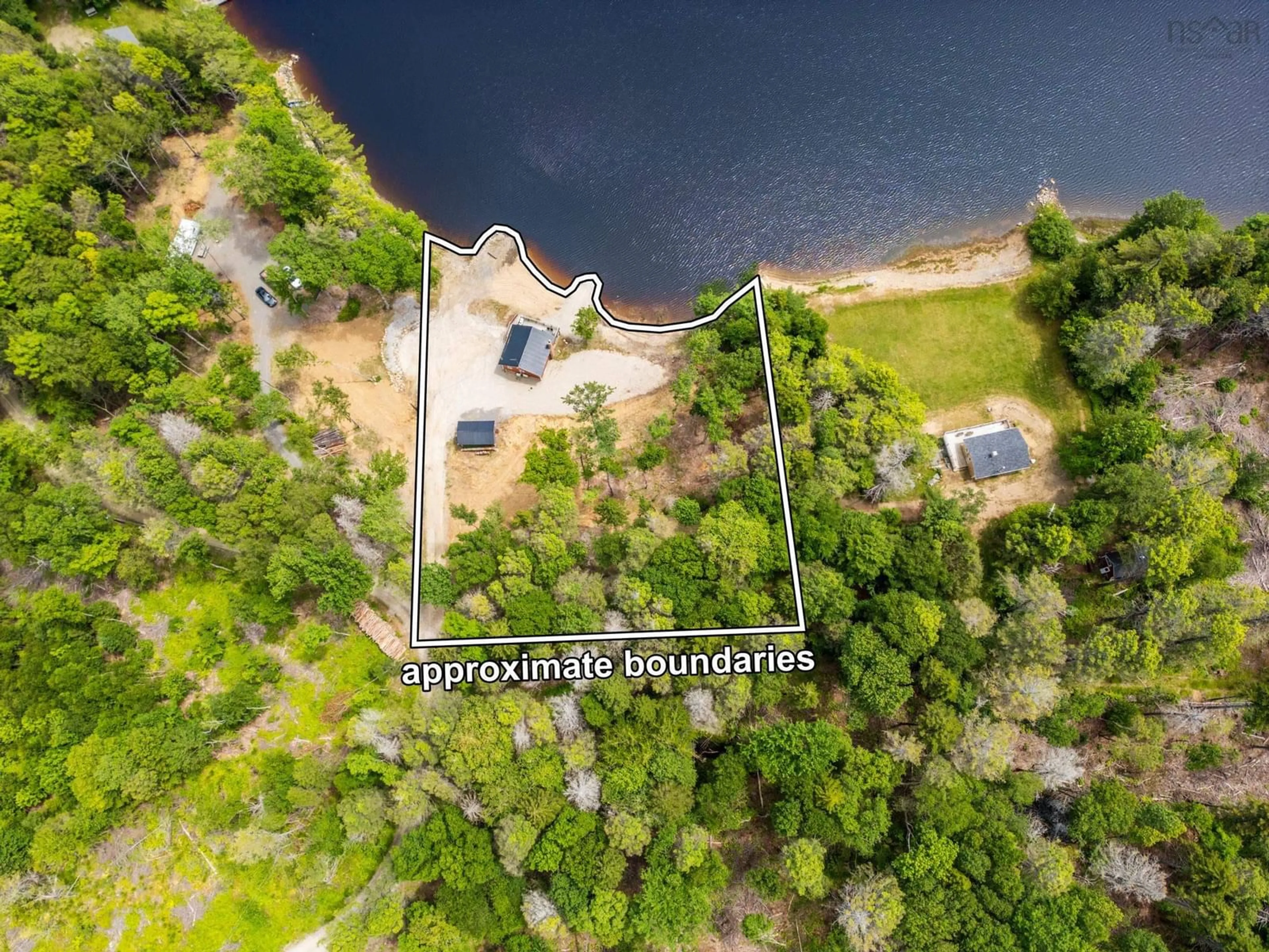 A pic from outside/outdoor area/front of a property/back of a property/a pic from drone, water/lake/river/ocean view for 144 Orchard Lane, Corberrie Nova Scotia B0W 3T0