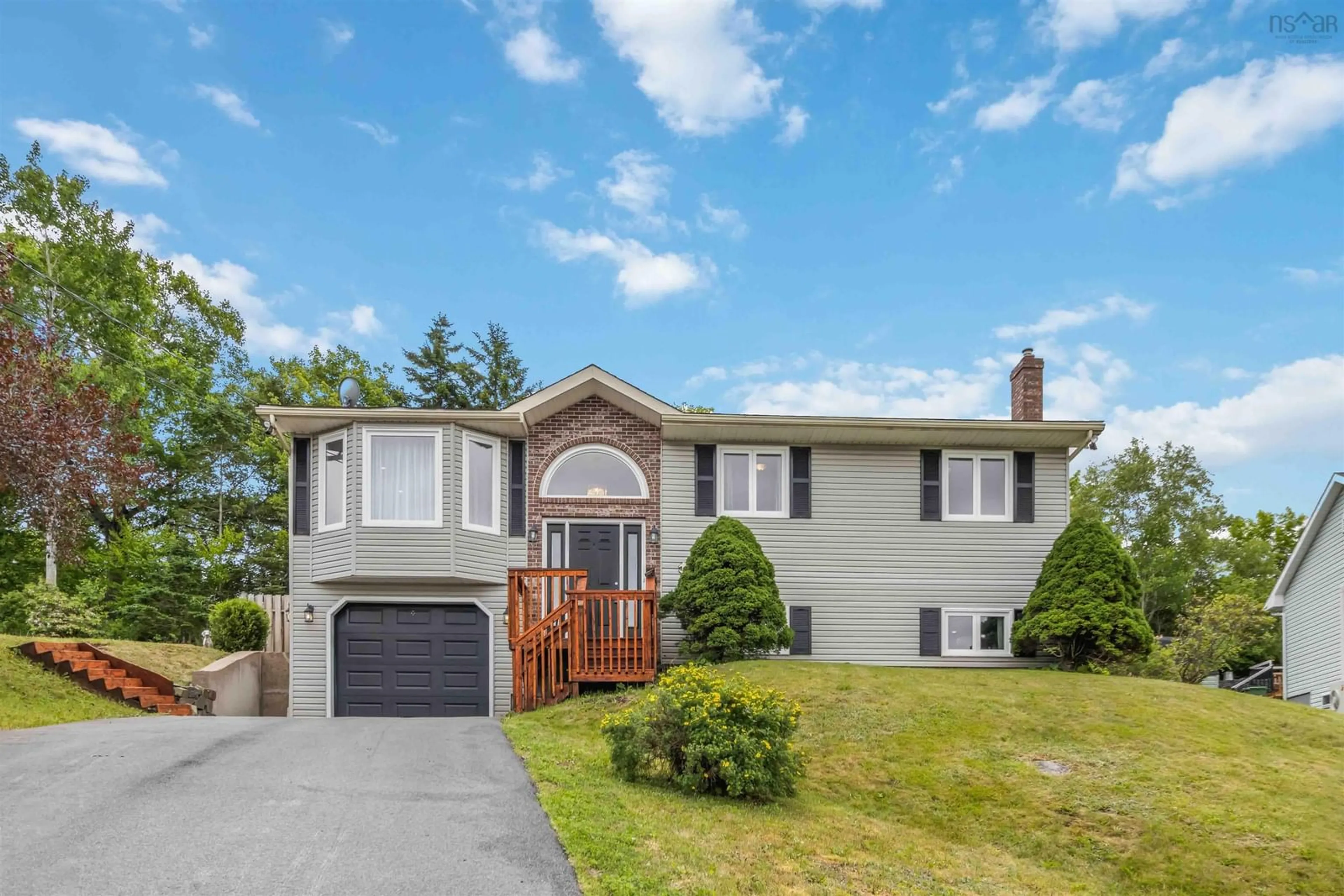 Home with vinyl exterior material, street for 14 Braemont Crt, Middle Sackville Nova Scotia B4E 3A1