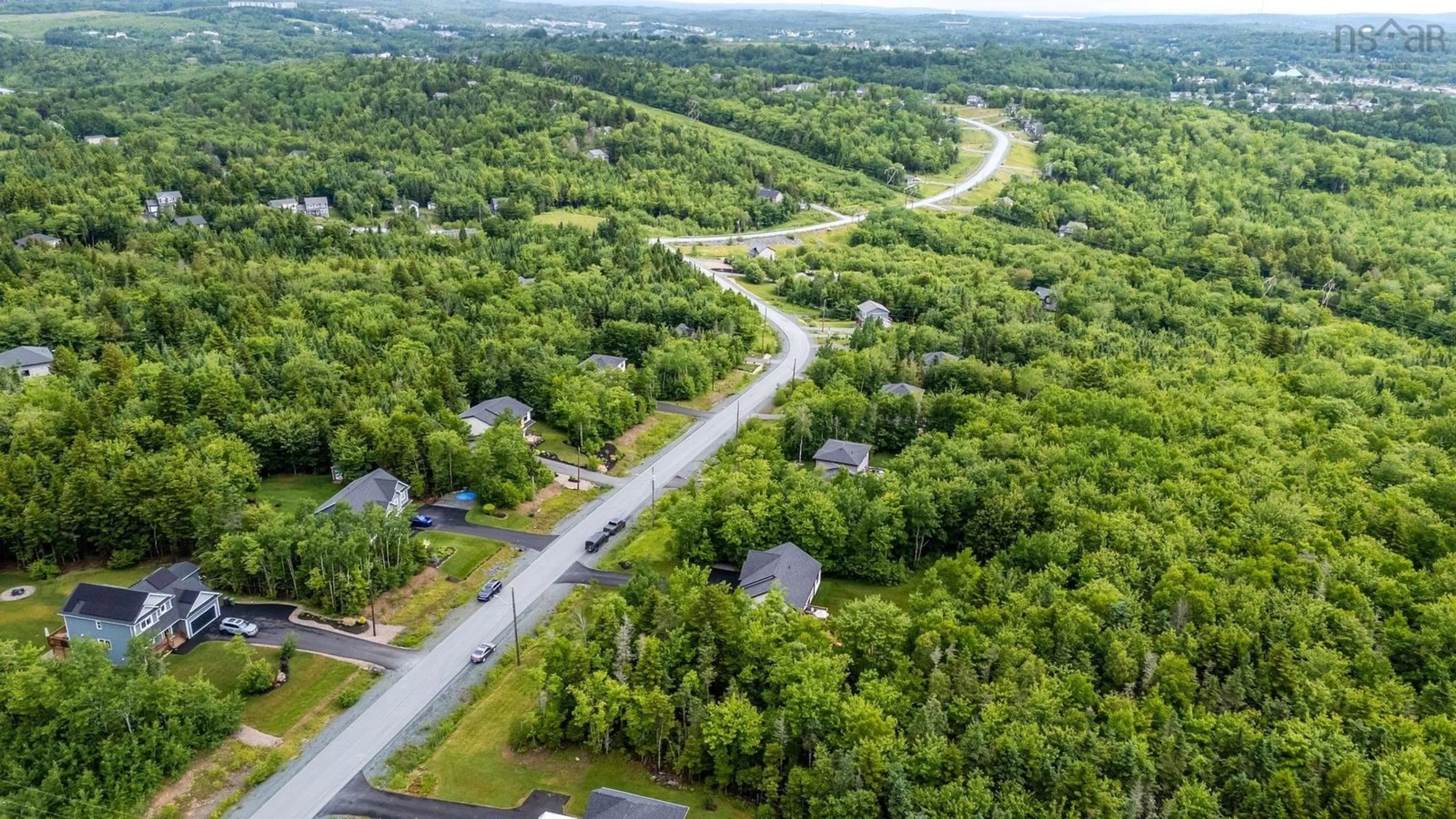 A pic from outside/outdoor area/front of a property/back of a property/a pic from drone, forest/trees view for 124 Edgett Dr, Lucasville Nova Scotia B4B 0V8