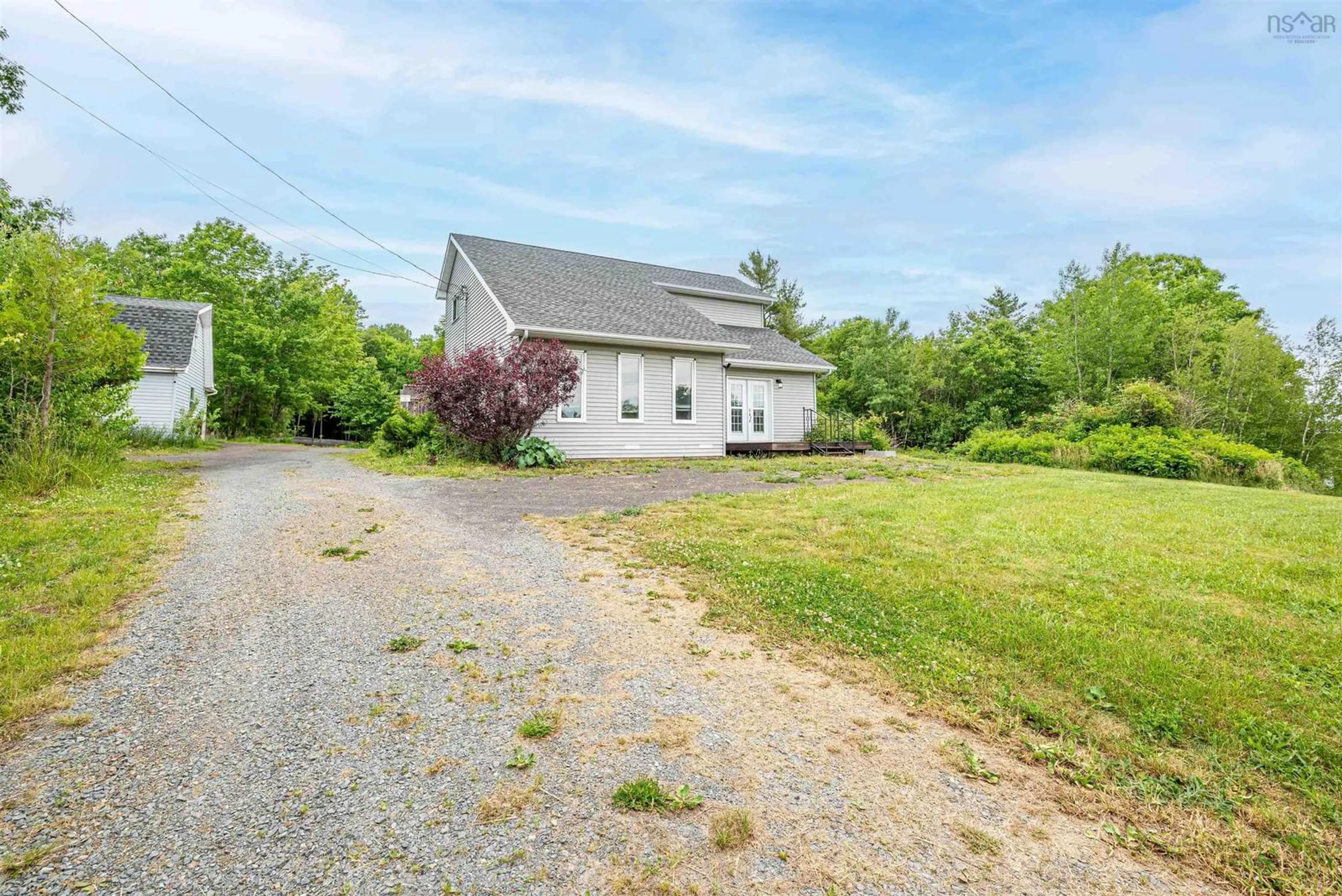 A pic from outside/outdoor area/front of a property/back of a property/a pic from drone, street for 13295 Highway 1, Lockhartville Nova Scotia B0P 1P0