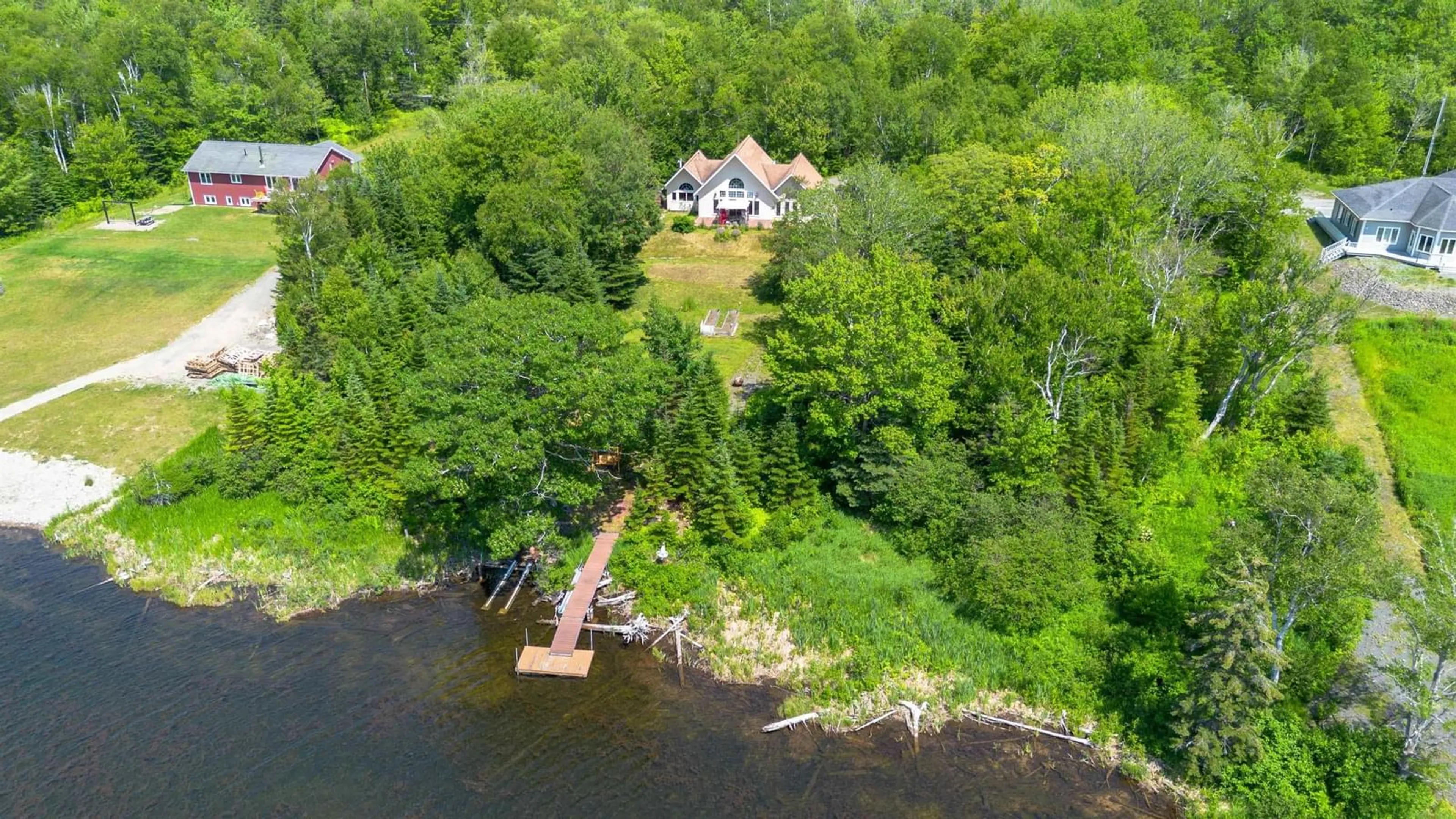 A pic from outside/outdoor area/front of a property/back of a property/a pic from drone, water/lake/river/ocean view for 54 Beverlys Hill Rd, Baddeck Inlet Nova Scotia B0E 1B0