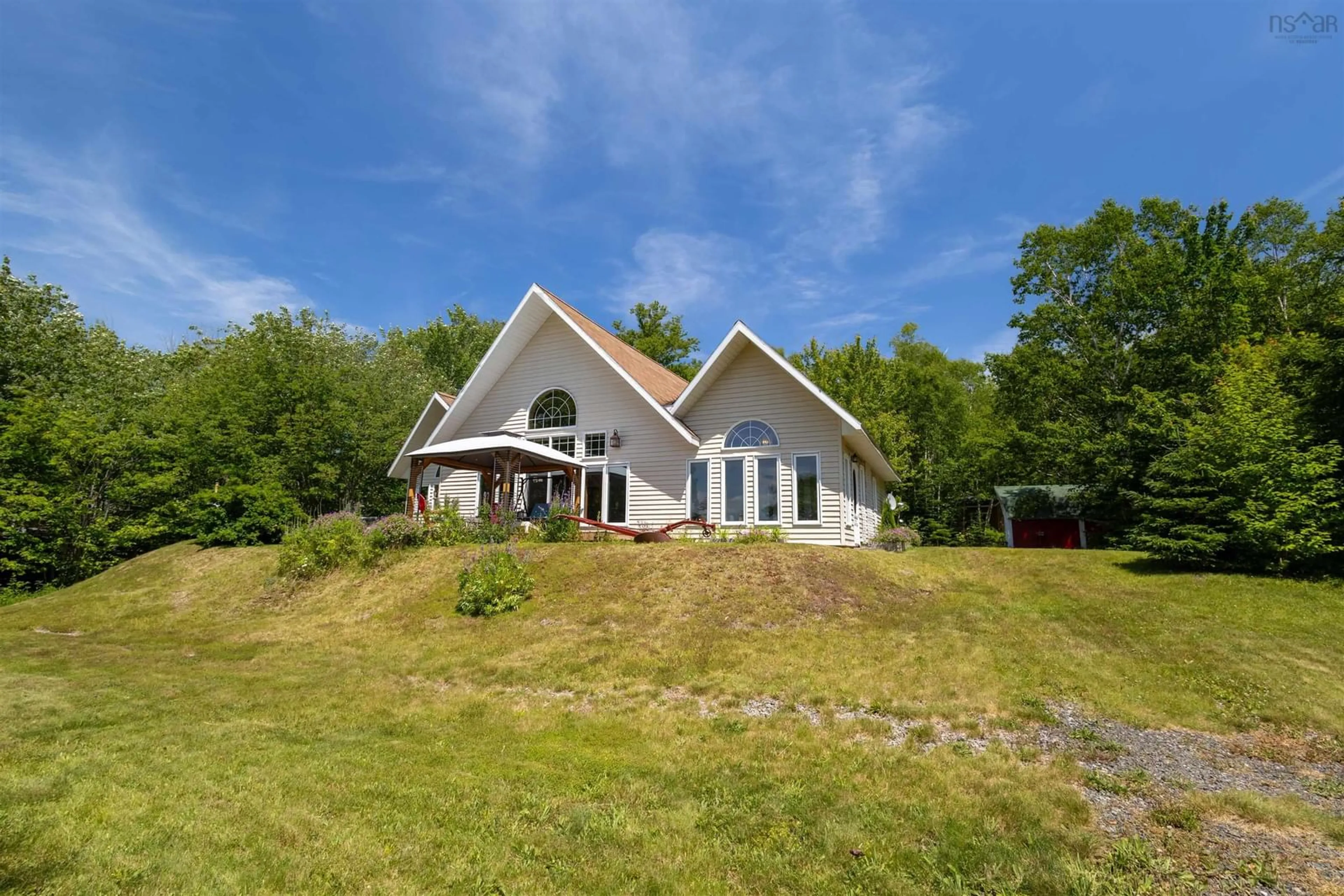 A pic from outside/outdoor area/front of a property/back of a property/a pic from drone, water/lake/river/ocean view for 54 Beverlys Hill Rd, Baddeck Inlet Nova Scotia B0E 1B0