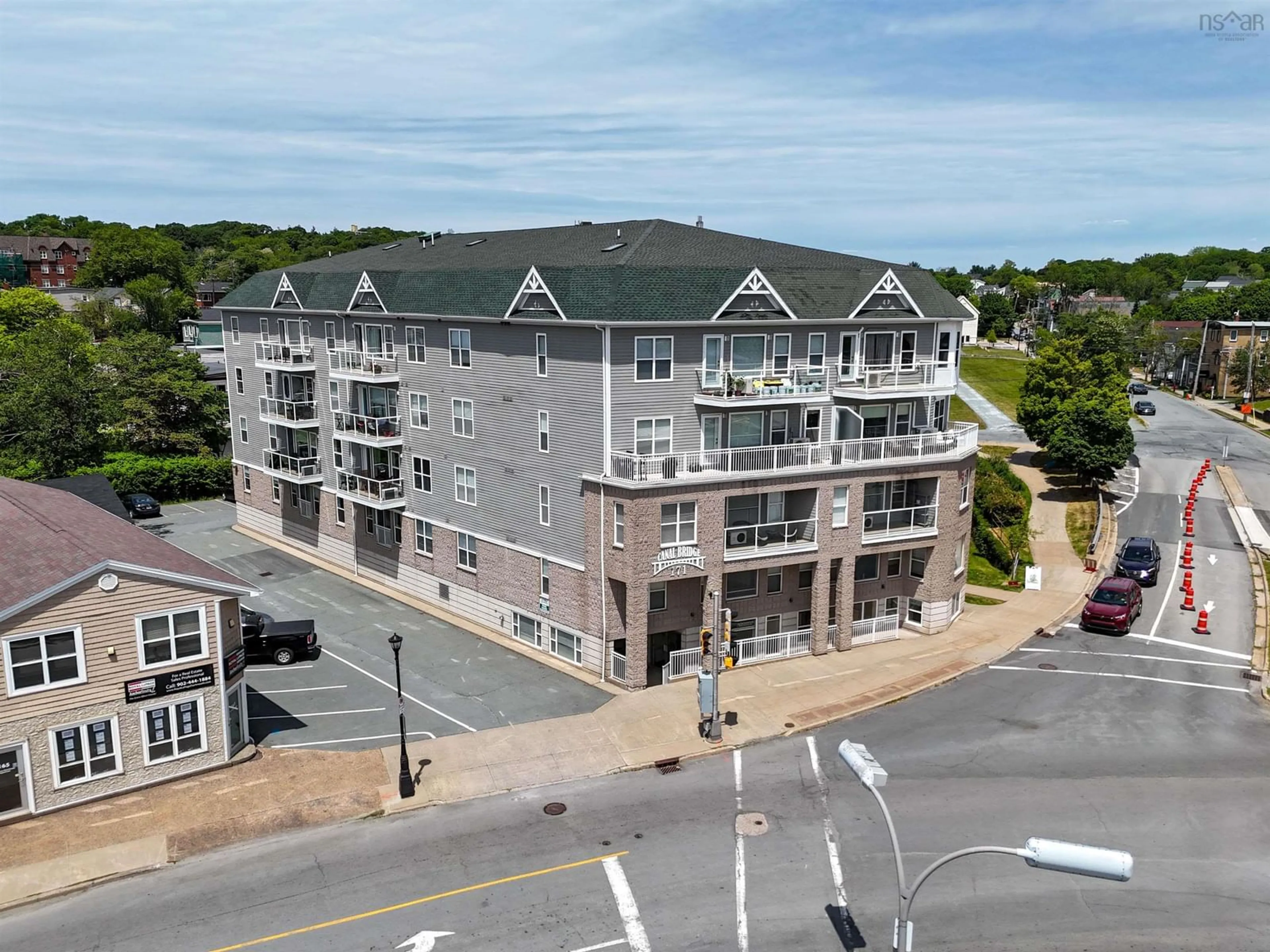 A pic from outside/outdoor area/front of a property/back of a property/a pic from drone, building for 171 Portland St #104, Dartmouth Nova Scotia B2Y 4X2