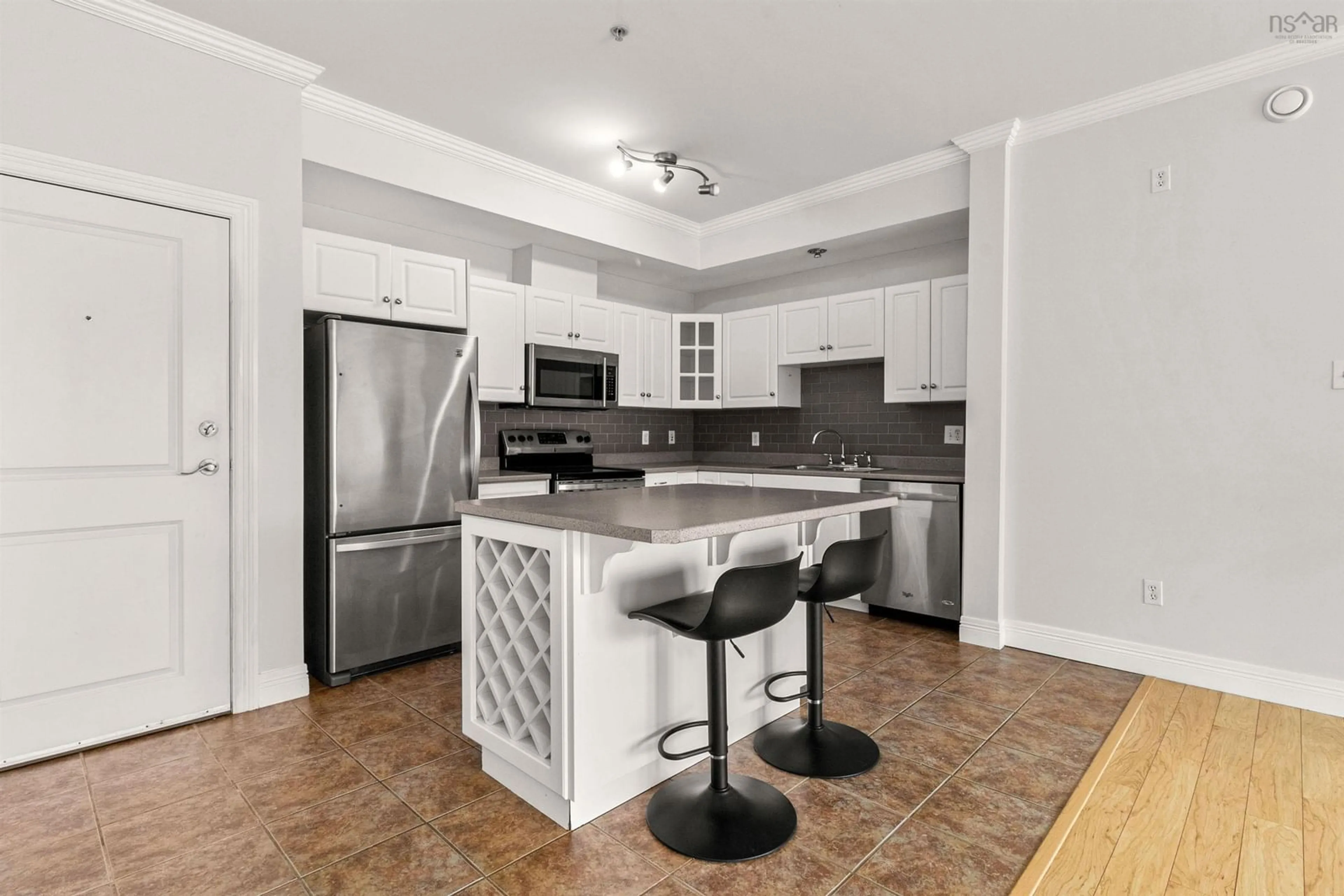 Open concept kitchen, ceramic/tile floor for 171 Portland St #104, Dartmouth Nova Scotia B2Y 4X2