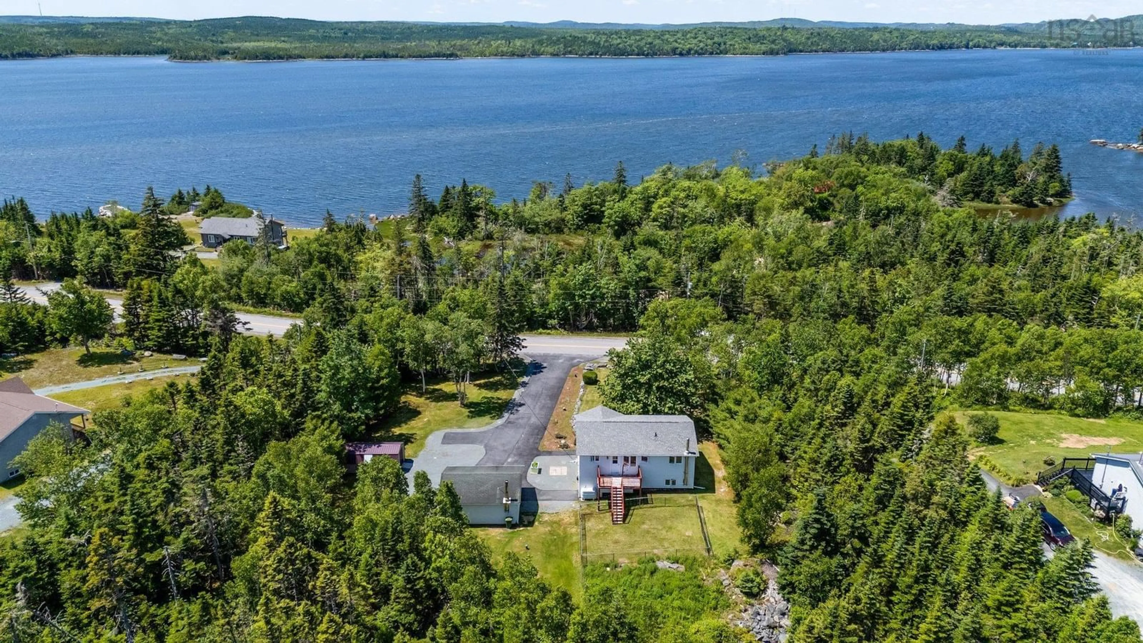 A pic from outside/outdoor area/front of a property/back of a property/a pic from drone, water/lake/river/ocean view for 501 Ostrea Lake Rd, Ostrea Lake Nova Scotia B0J 2L0