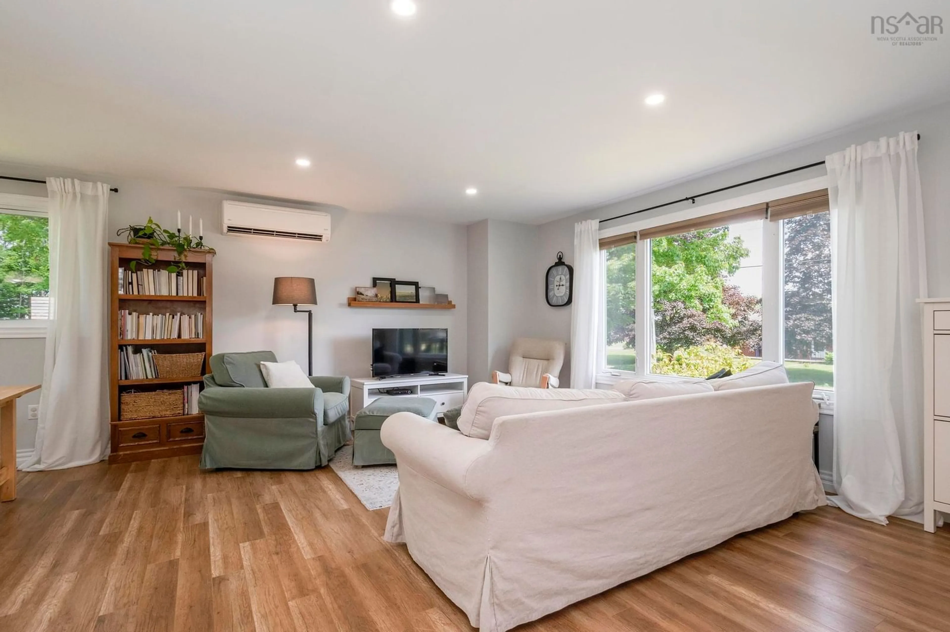 Living room with furniture, wood/laminate floor for 3 Bentley Dr, Middleton Nova Scotia B0S 1P0