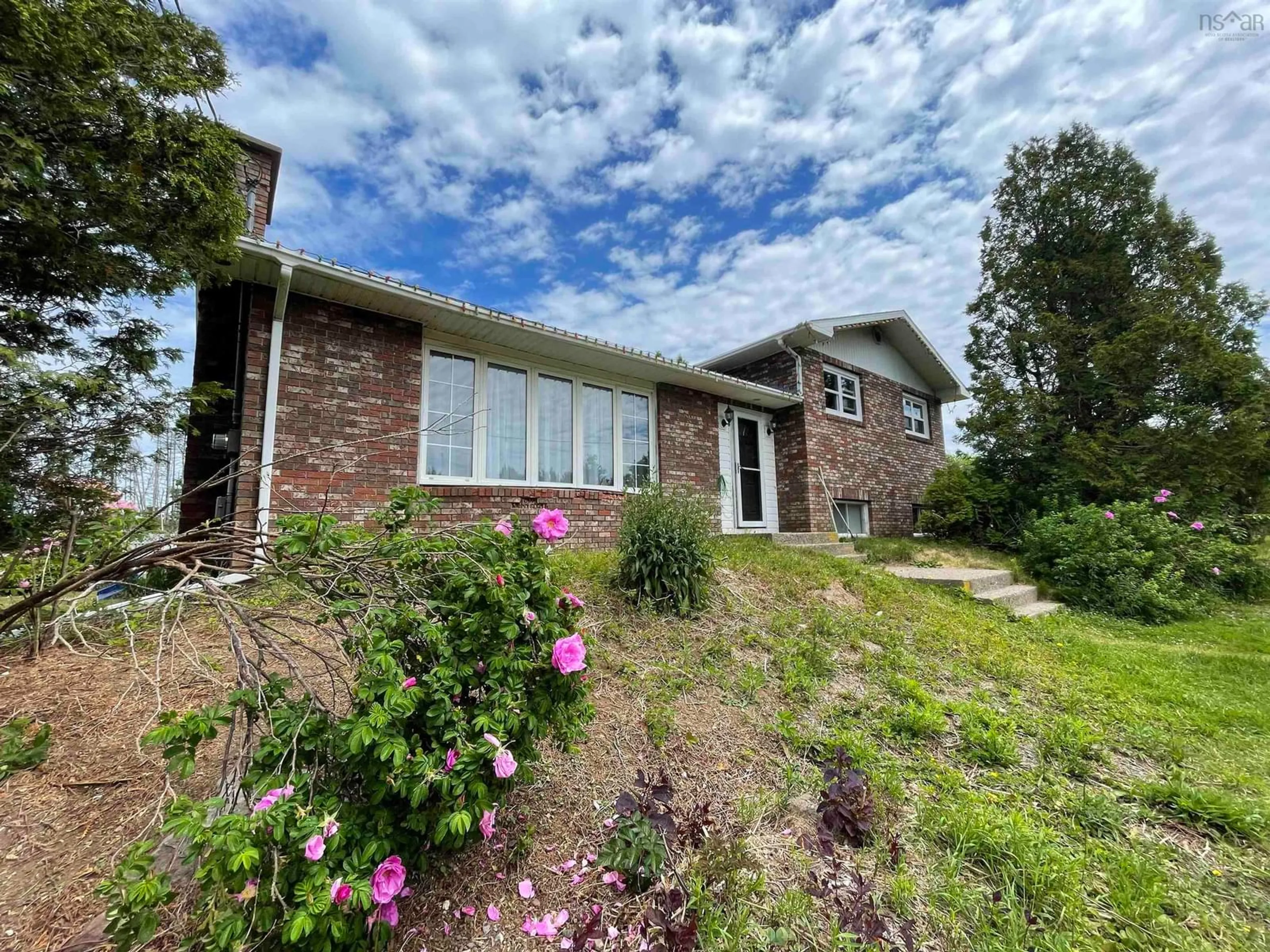 A pic from outside/outdoor area/front of a property/back of a property/a pic from drone, unknown for 6313 Louisbourg Hwy, Catalone Nova Scotia B1C 1R9