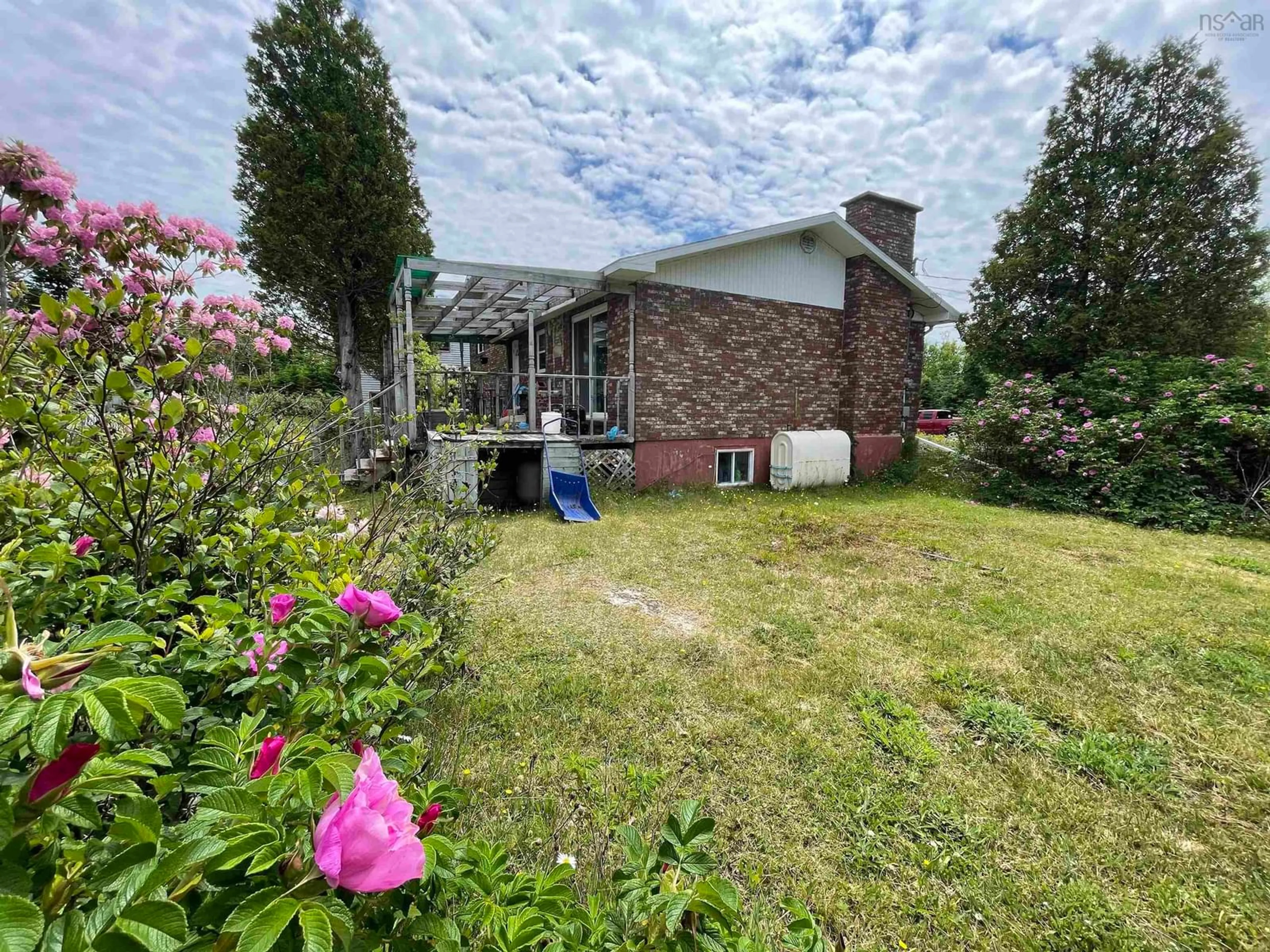 A pic from outside/outdoor area/front of a property/back of a property/a pic from drone, unknown for 6313 Louisbourg Hwy, Catalone Nova Scotia B1C 1R9