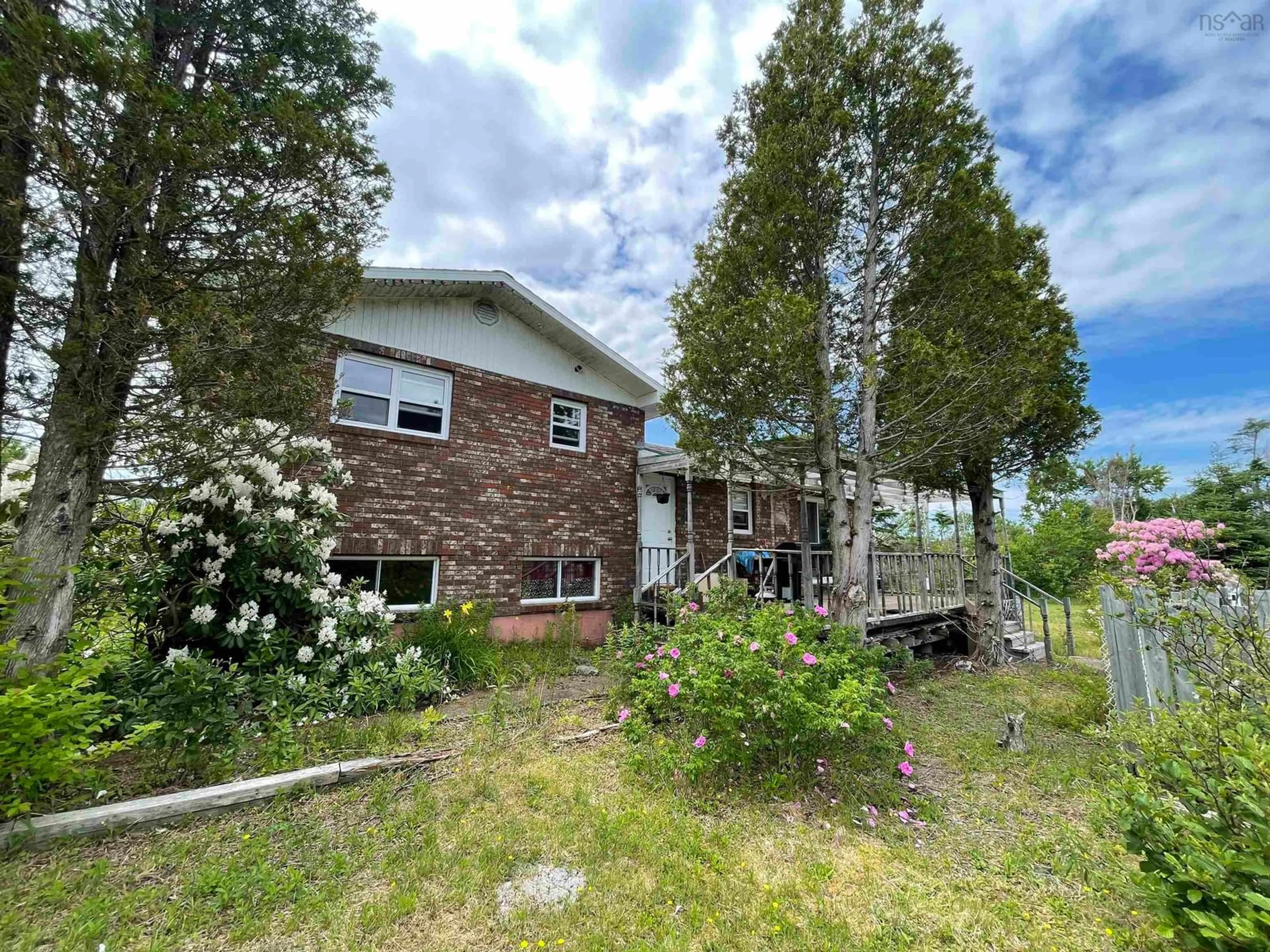 A pic from outside/outdoor area/front of a property/back of a property/a pic from drone, unknown for 6313 Louisbourg Hwy, Catalone Nova Scotia B1C 1R9