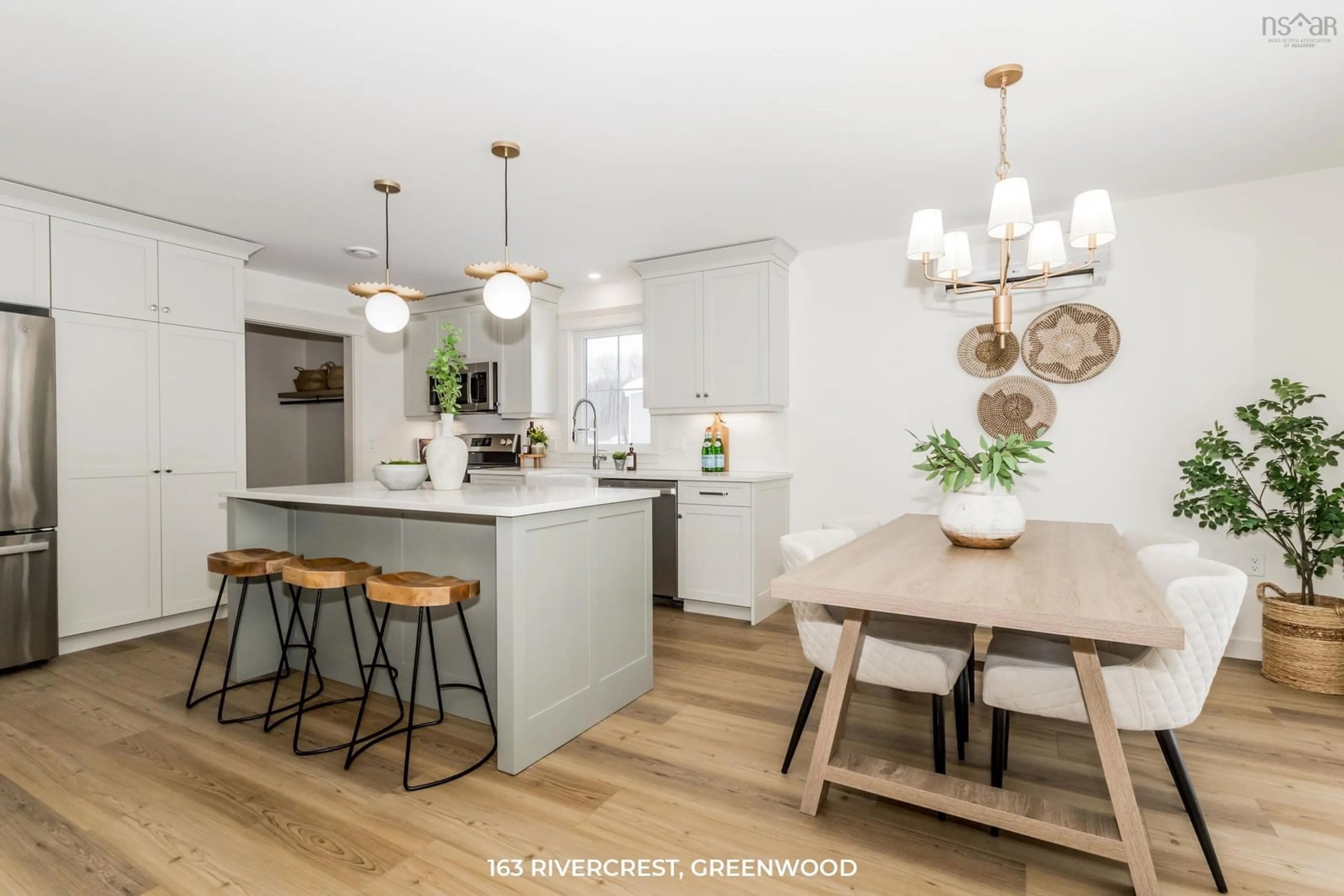 Open concept kitchen, wood/laminate floor for 126 Seneca St, Centreville Nova Scotia B0P 1J0