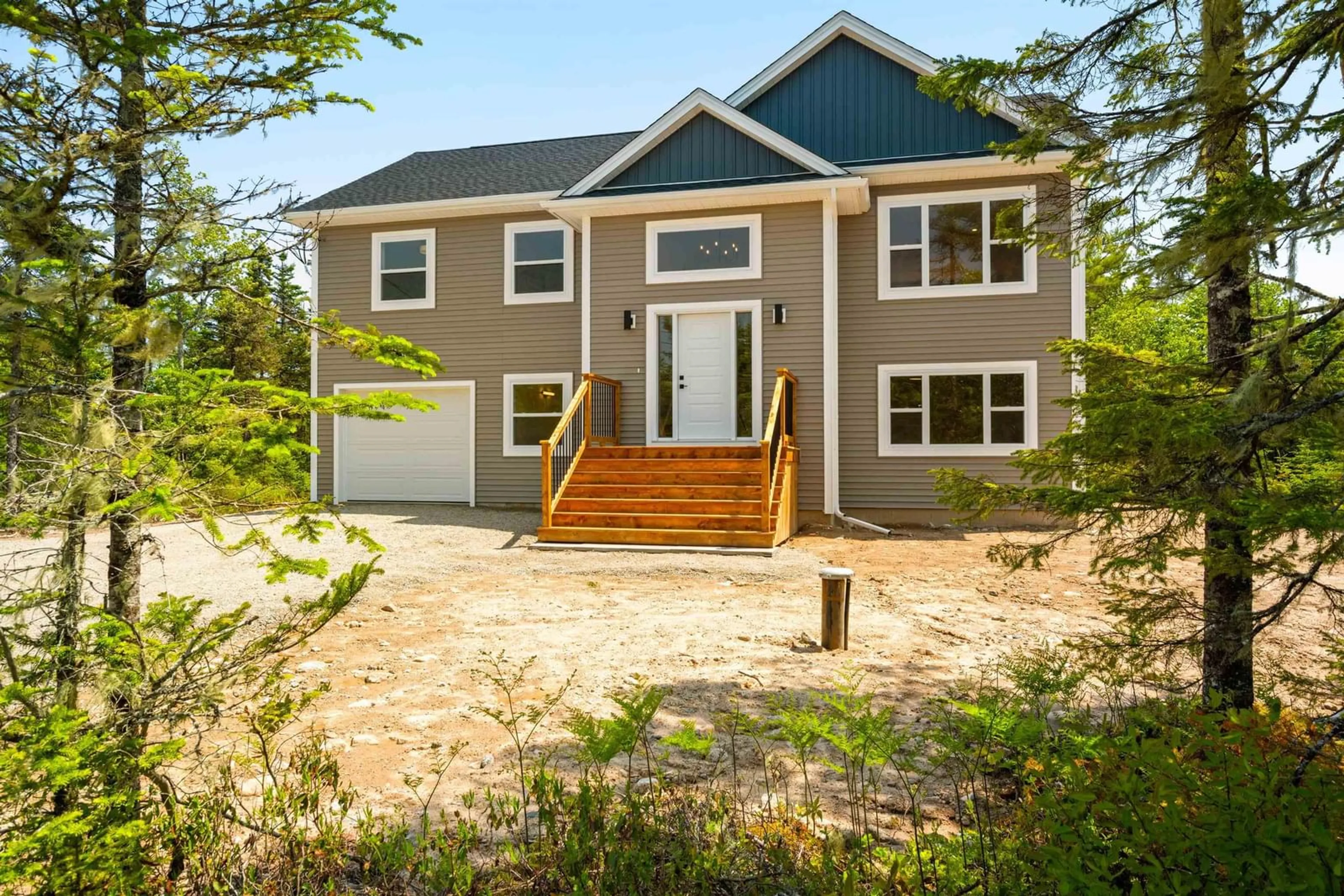 Home with vinyl exterior material, street for 64 Noonan Lake Lane, Simms Settlement Nova Scotia B0J 1T0