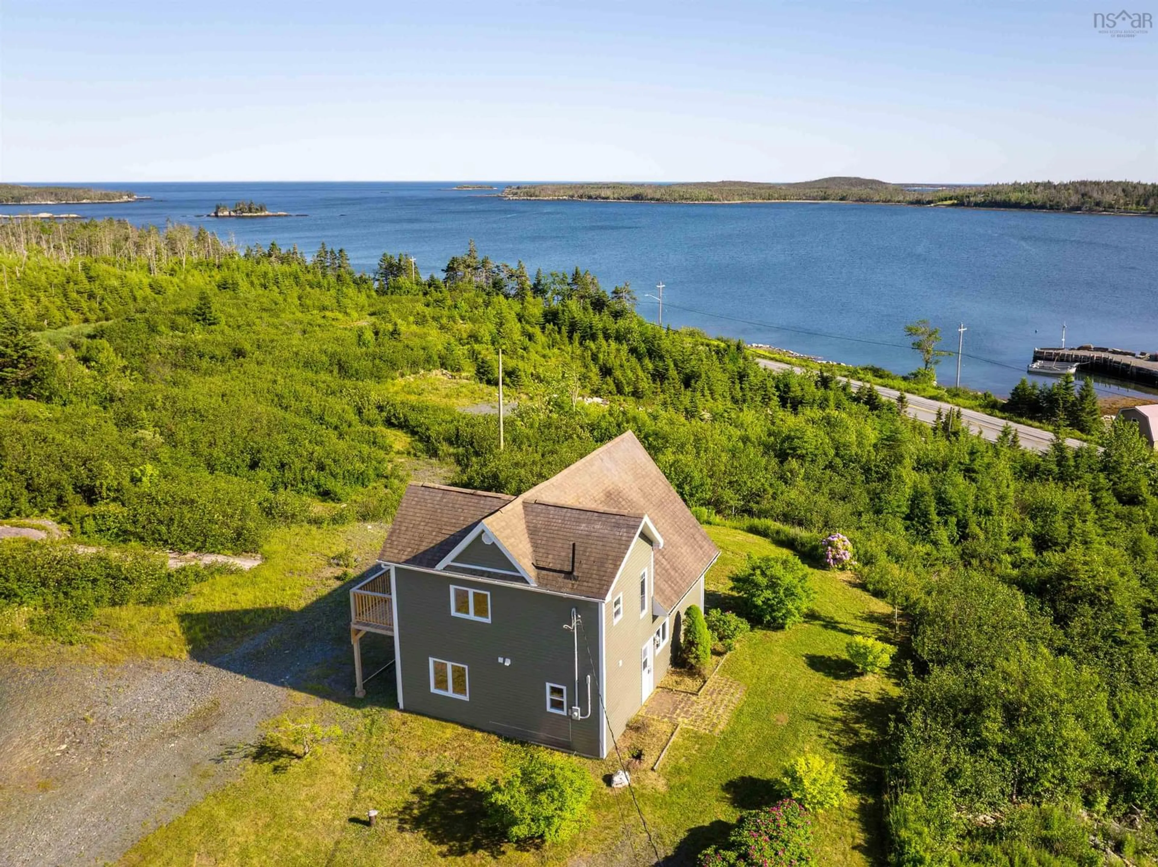 A pic from outside/outdoor area/front of a property/back of a property/a pic from drone, water/lake/river/ocean view for 45 Platinum Lane, Popes Harbour Nova Scotia B0J 3H0