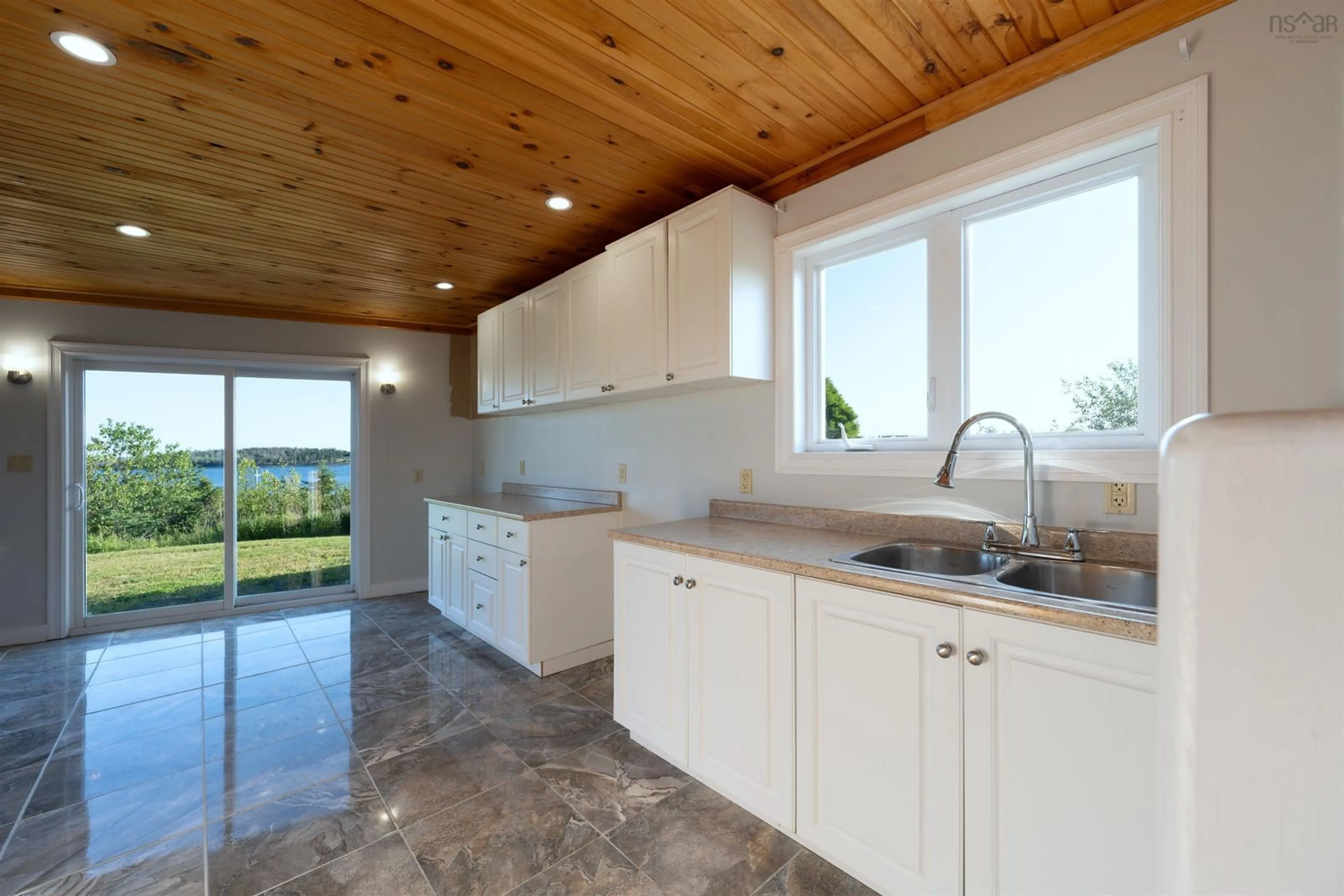 Open concept kitchen, ceramic/tile floor for 45 Platinum Lane, Popes Harbour Nova Scotia B0J 3H0