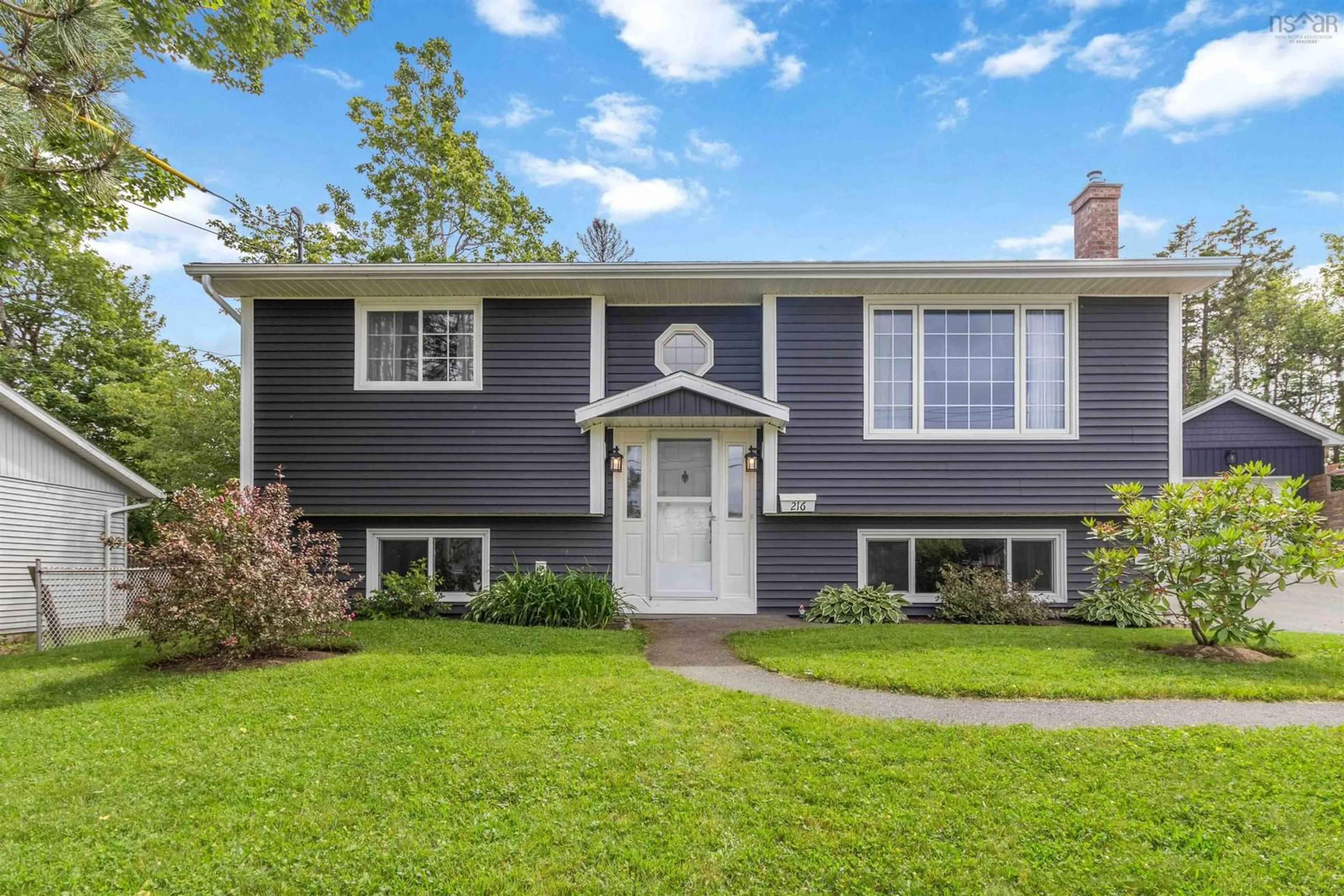 Home with vinyl exterior material, street for 216 Cavalier Dr, Lower Sackville Nova Scotia B4C 3L9