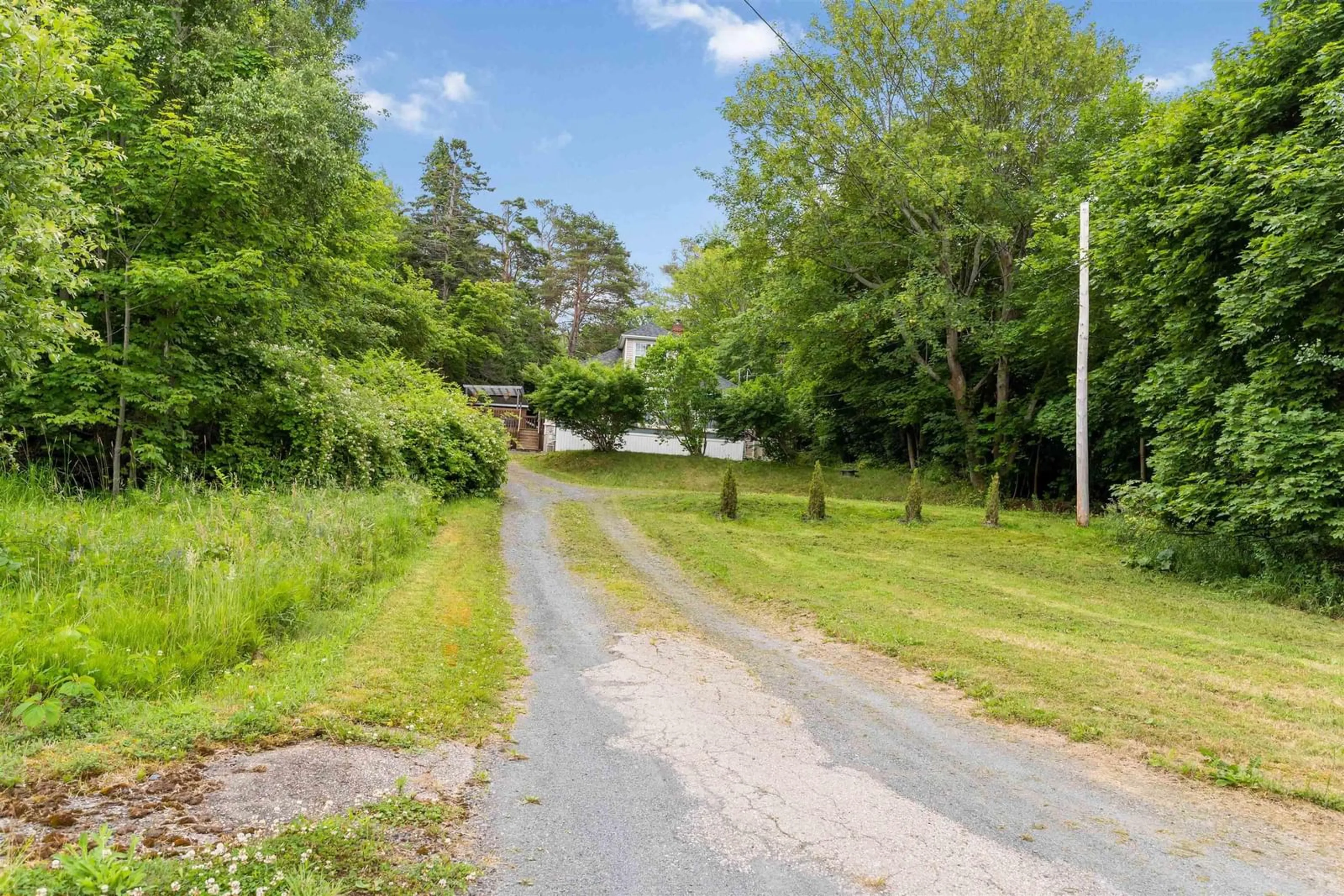A pic from outside/outdoor area/front of a property/back of a property/a pic from drone, street for 566 Highway 1, Smiths Cove Nova Scotia B0S 1S0