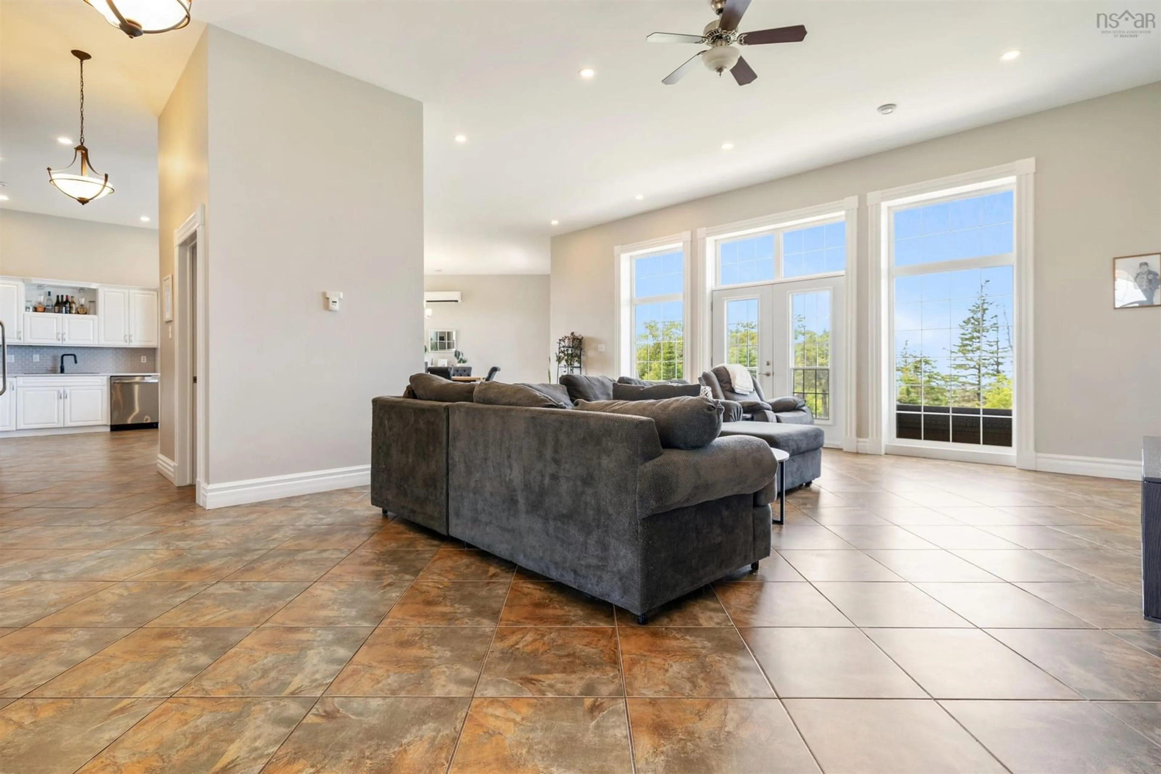 Living room with furniture, ceramic/tile floor for 61 Wilfred Macdonald Rd, Kirkmount Nova Scotia B0K 1W0