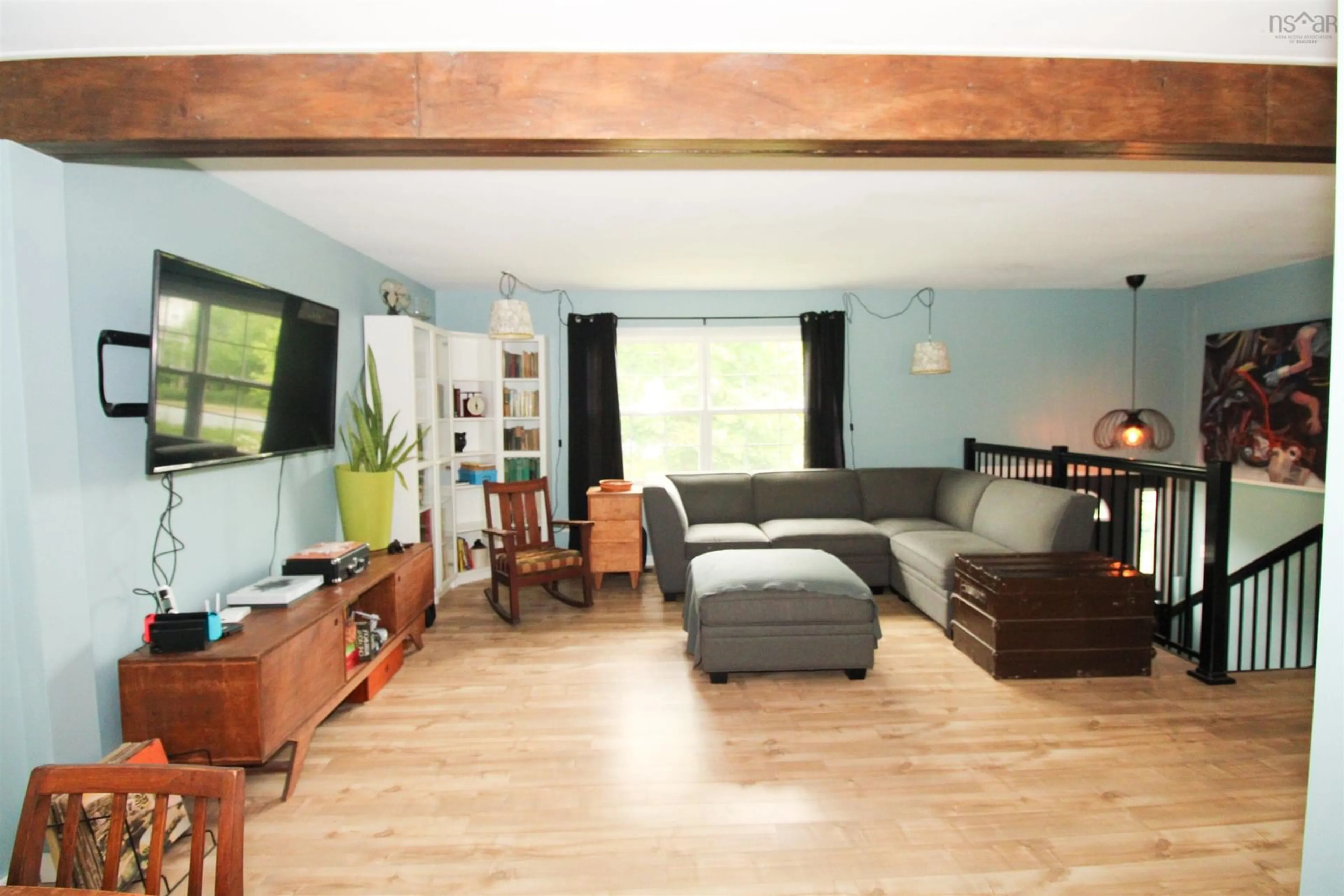 Living room with furniture, wood/laminate floor for 58 Majestic Ave, Beaver Bank Nova Scotia B4E 3A5