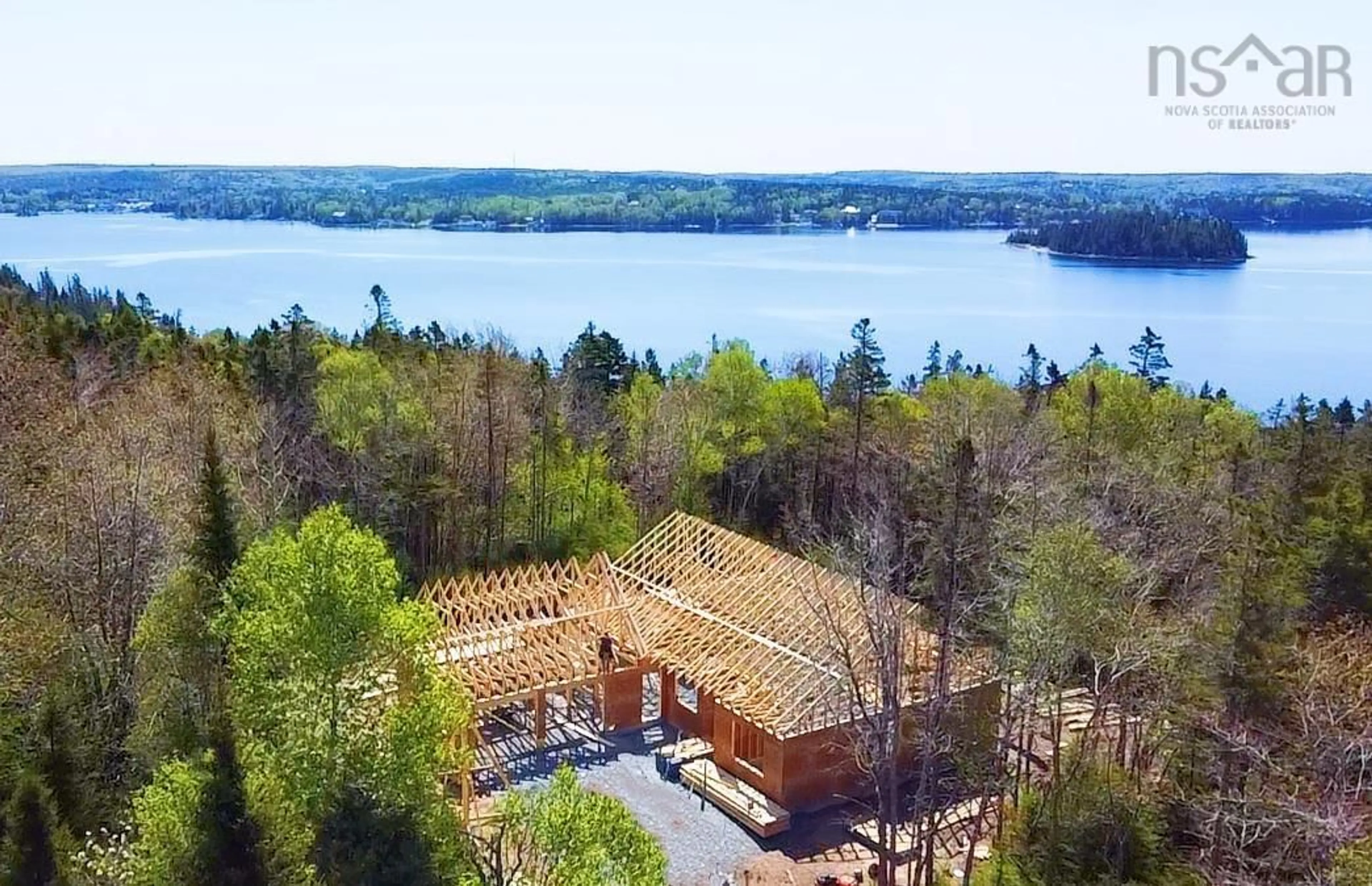 A pic from outside/outdoor area/front of a property/back of a property/a pic from drone, water/lake/river/ocean view for 85 Hillside Dr #Lot 1-3, Boutiliers Point Nova Scotia B3Z 1W9