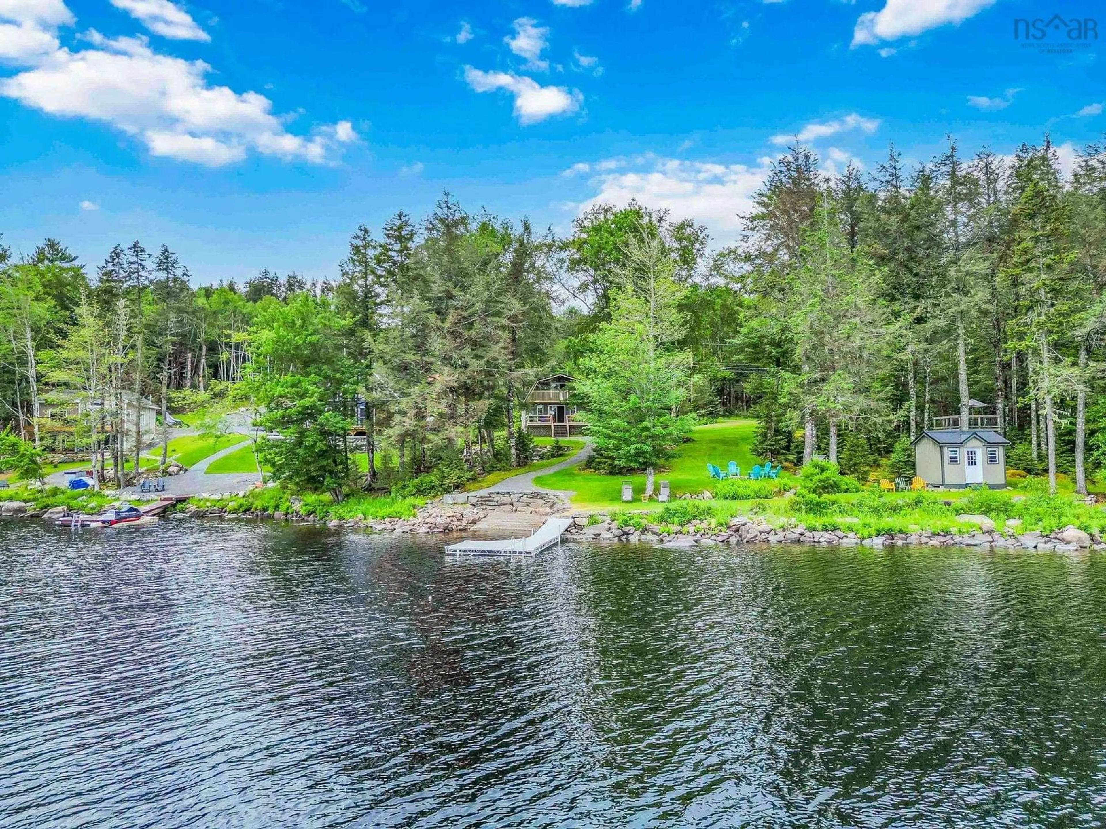 A pic from outside/outdoor area/front of a property/back of a property/a pic from drone, water/lake/river/ocean view for 87 Sunset Linkway, Labelle Nova Scotia B0T 1E0