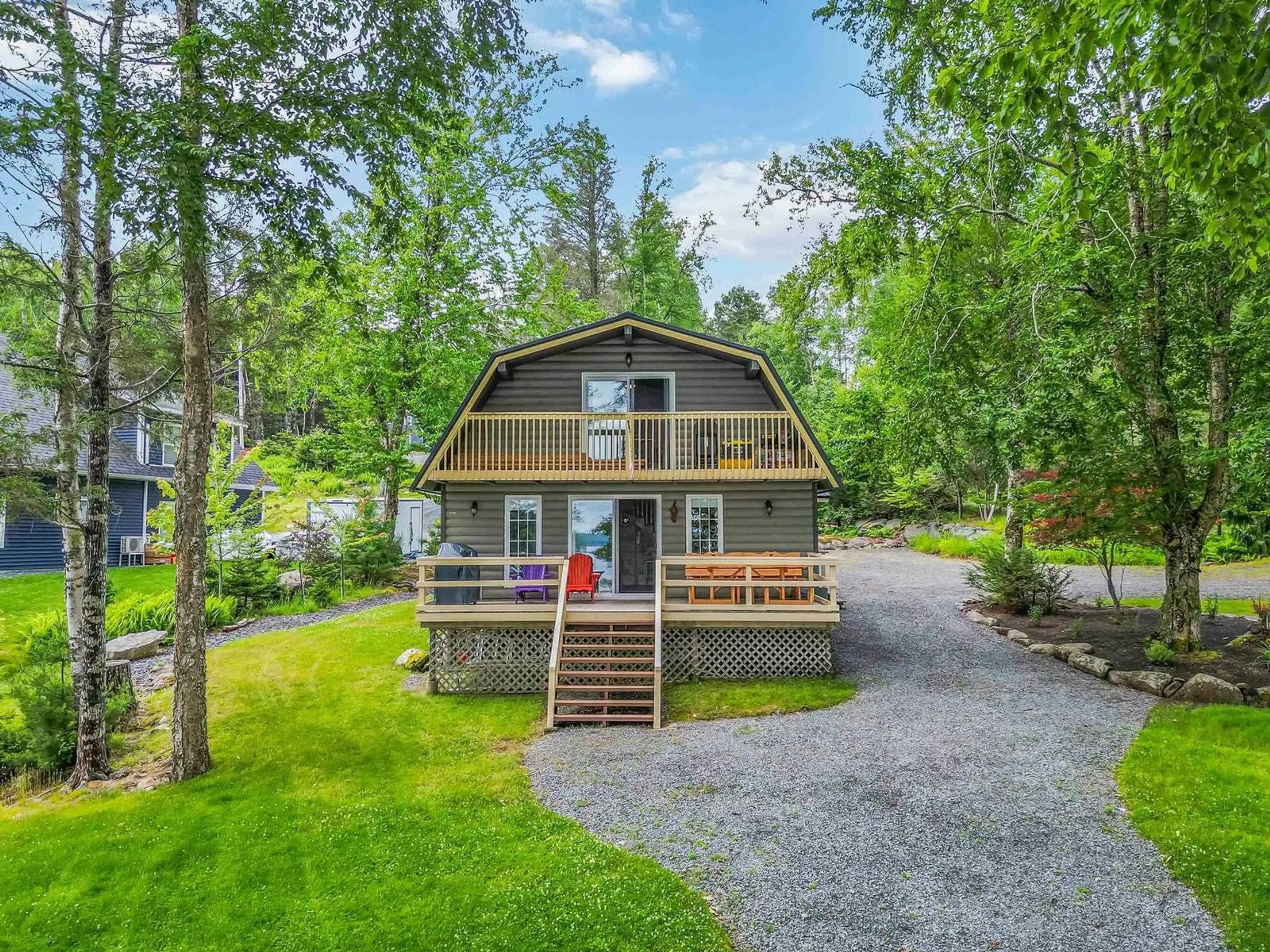 A pic from outside/outdoor area/front of a property/back of a property/a pic from drone, water/lake/river/ocean view for 87 Sunset Linkway, Labelle Nova Scotia B0T 1E0
