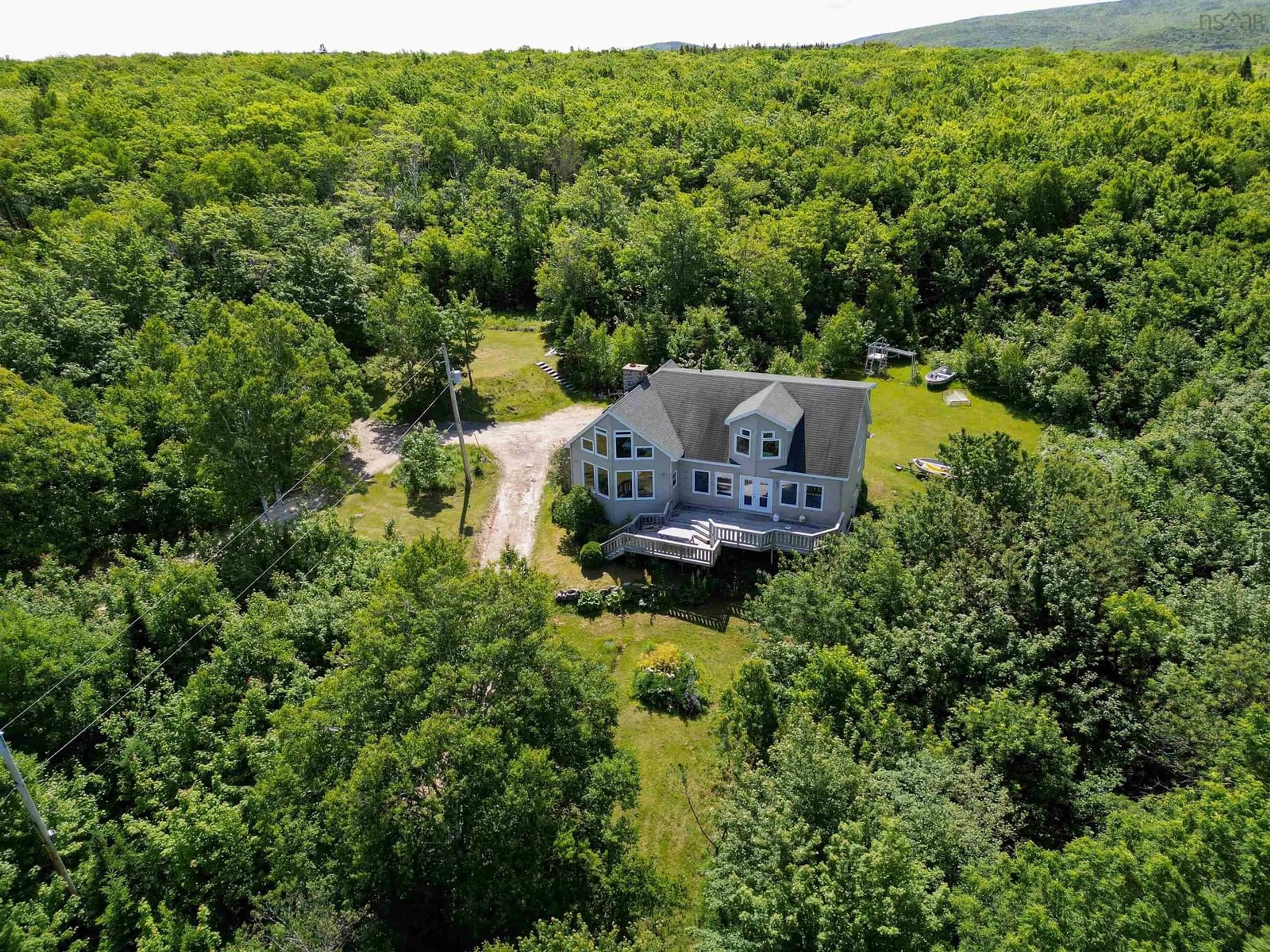 A pic from outside/outdoor area/front of a property/back of a property/a pic from drone, unknown for 181 Bay St Lawrence Rd, Cape North Nova Scotia B0C 1G0