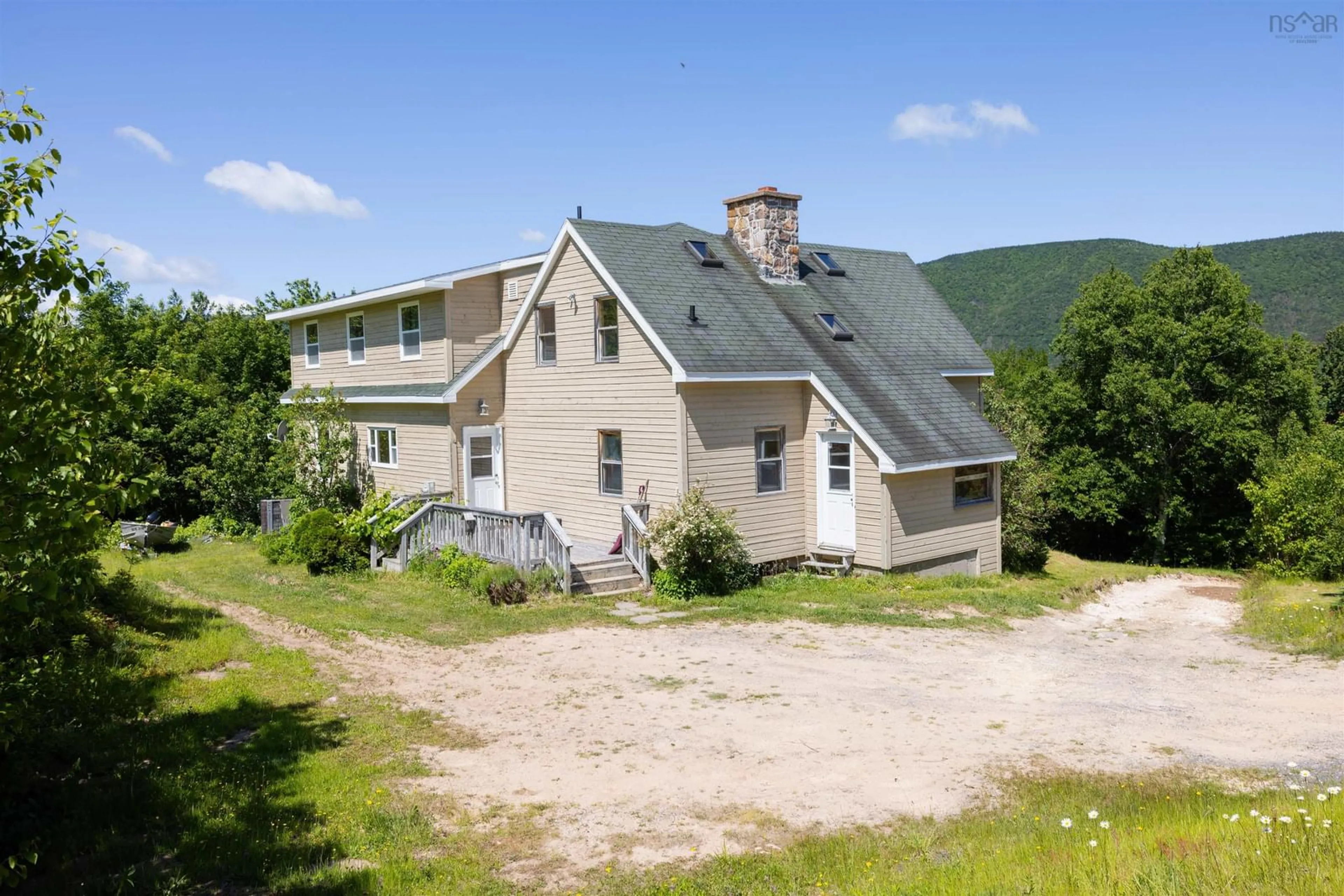A pic from outside/outdoor area/front of a property/back of a property/a pic from drone, mountain view for 181 Bay St Lawrence Rd, Cape North Nova Scotia B0C 1G0