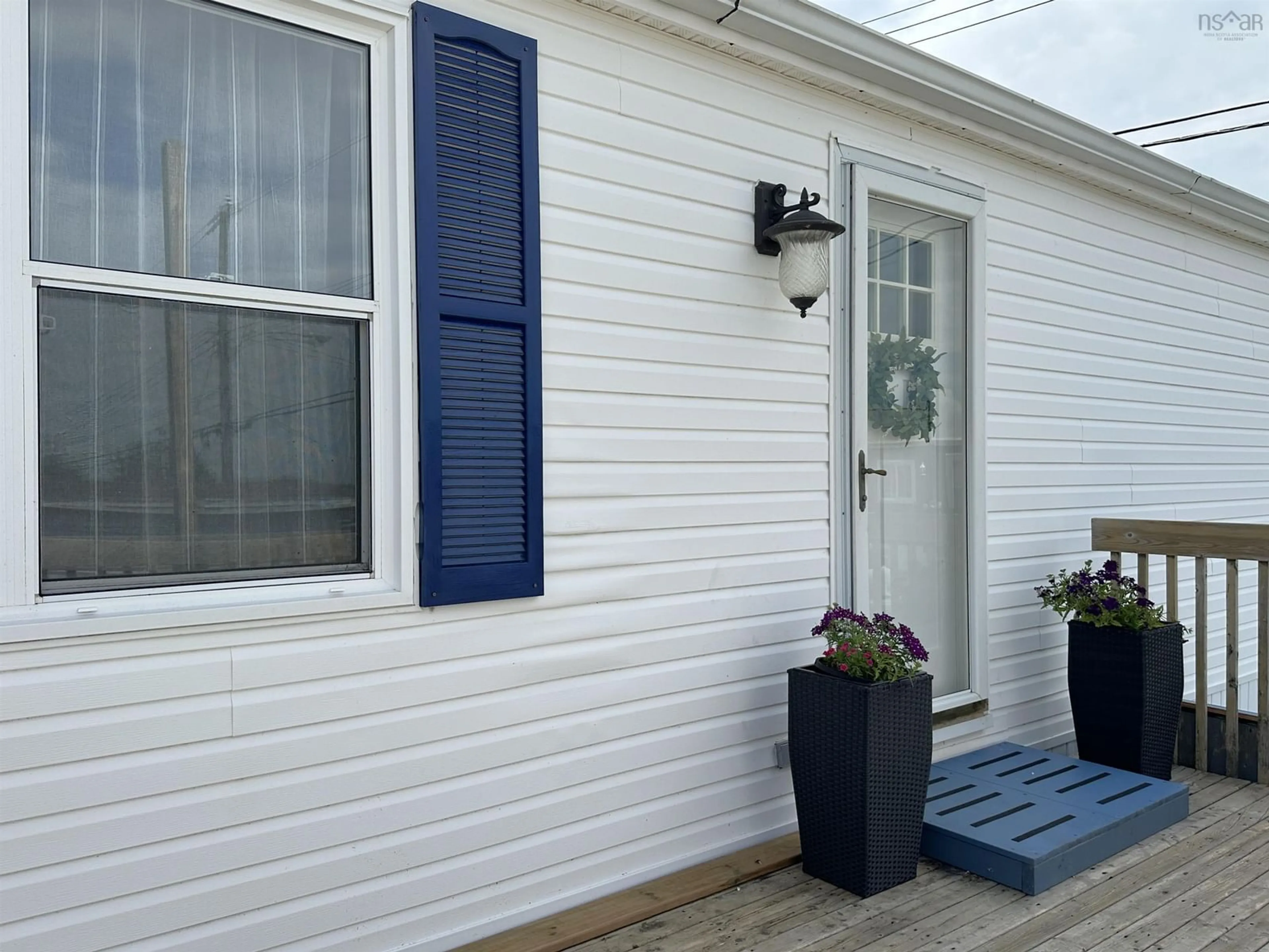 Home with vinyl exterior material, street for 23 Maple Lane, Eastern Passage Nova Scotia B3G 1A8