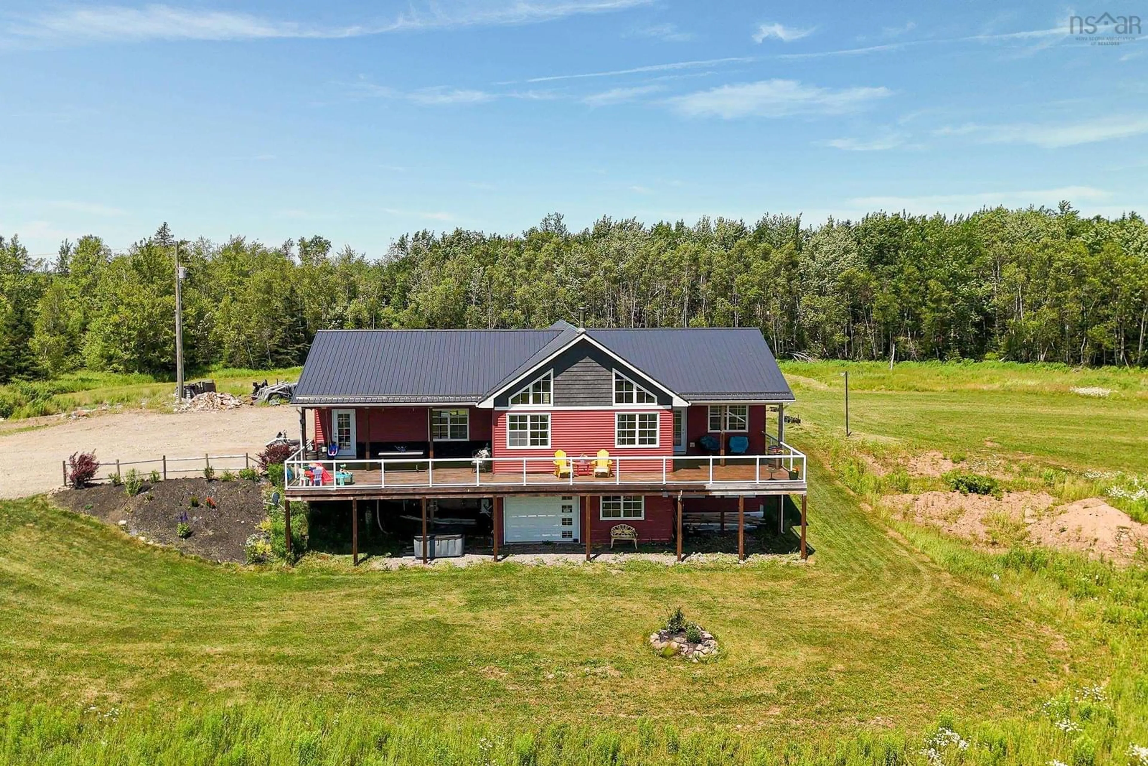 A pic from outside/outdoor area/front of a property/back of a property/a pic from drone, unknown for 249 Ridge Rd, South Branch Nova Scotia B0N 2P0