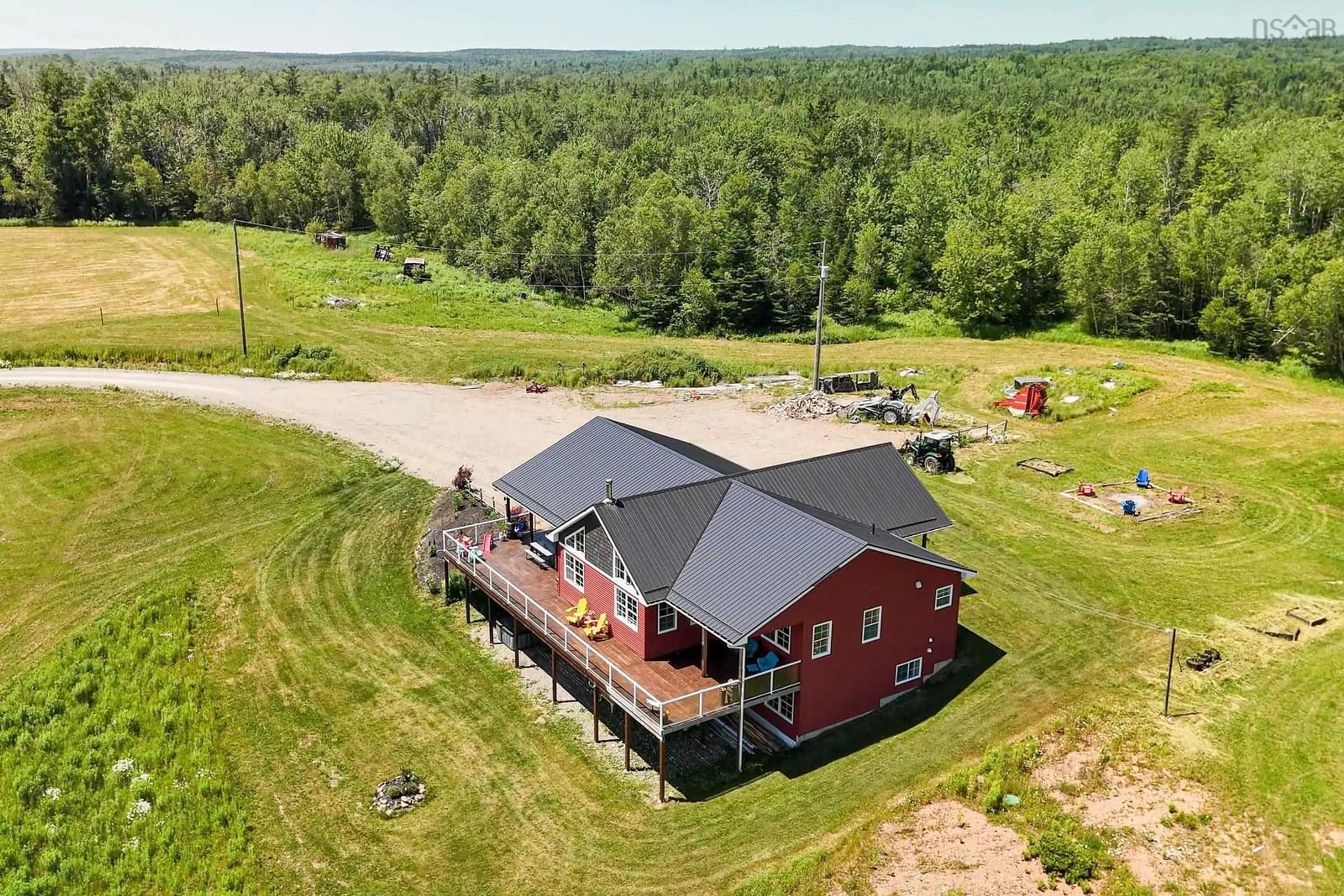 A pic from outside/outdoor area/front of a property/back of a property/a pic from drone, building for 249 Ridge Rd, South Branch Nova Scotia B0N 2P0