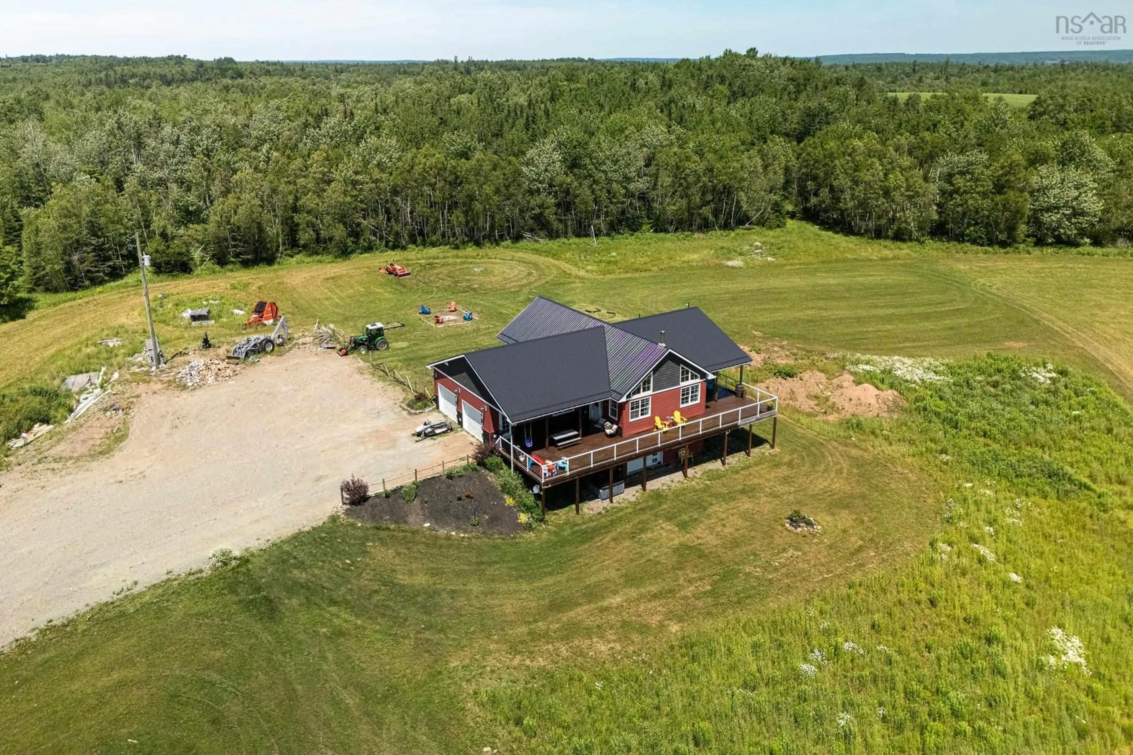 A pic from outside/outdoor area/front of a property/back of a property/a pic from drone, building for 249 Ridge Rd, South Branch Nova Scotia B0N 2P0
