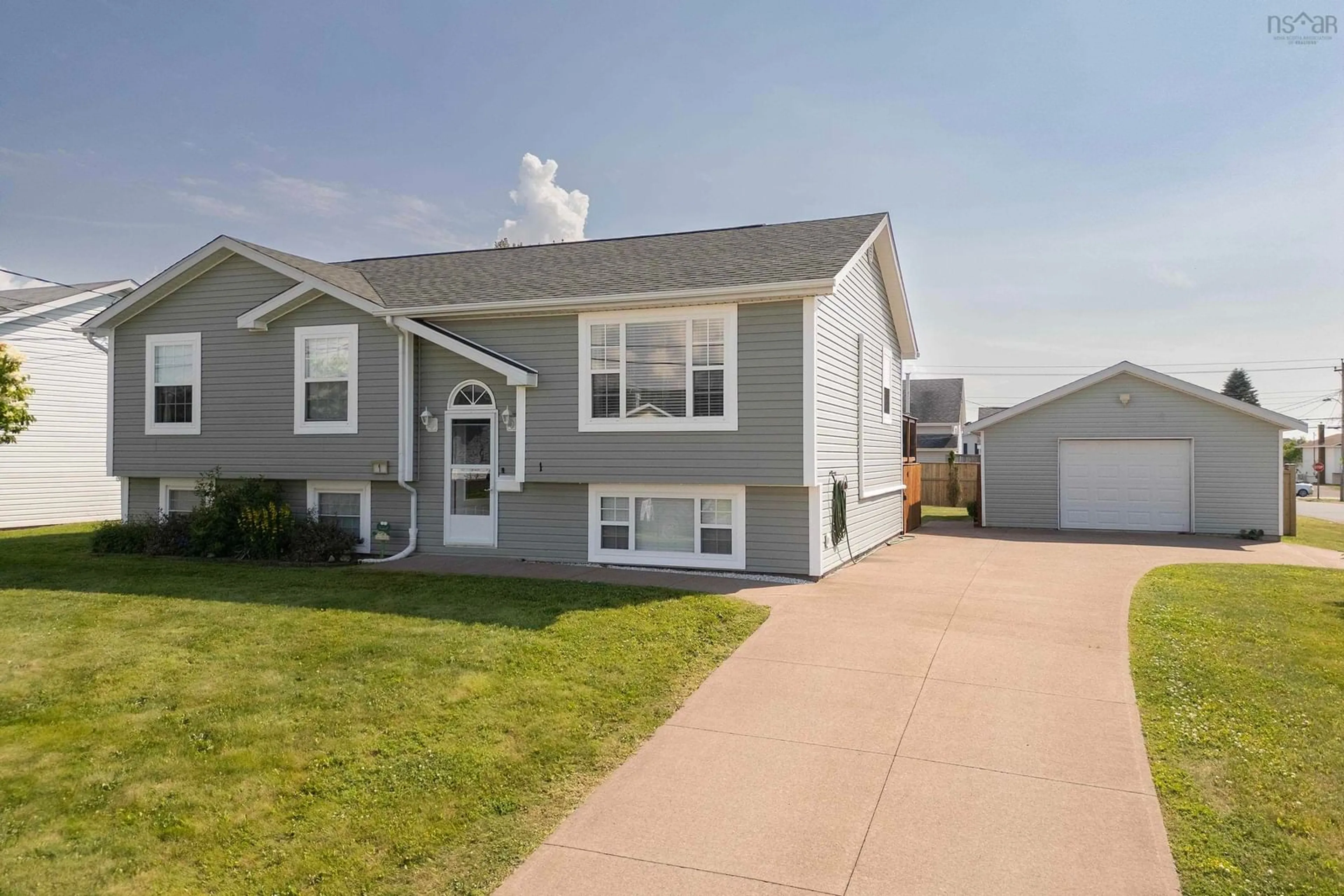 Home with vinyl exterior material, street for 1 Paradise Ave, Amherst Nova Scotia B4H 4W9