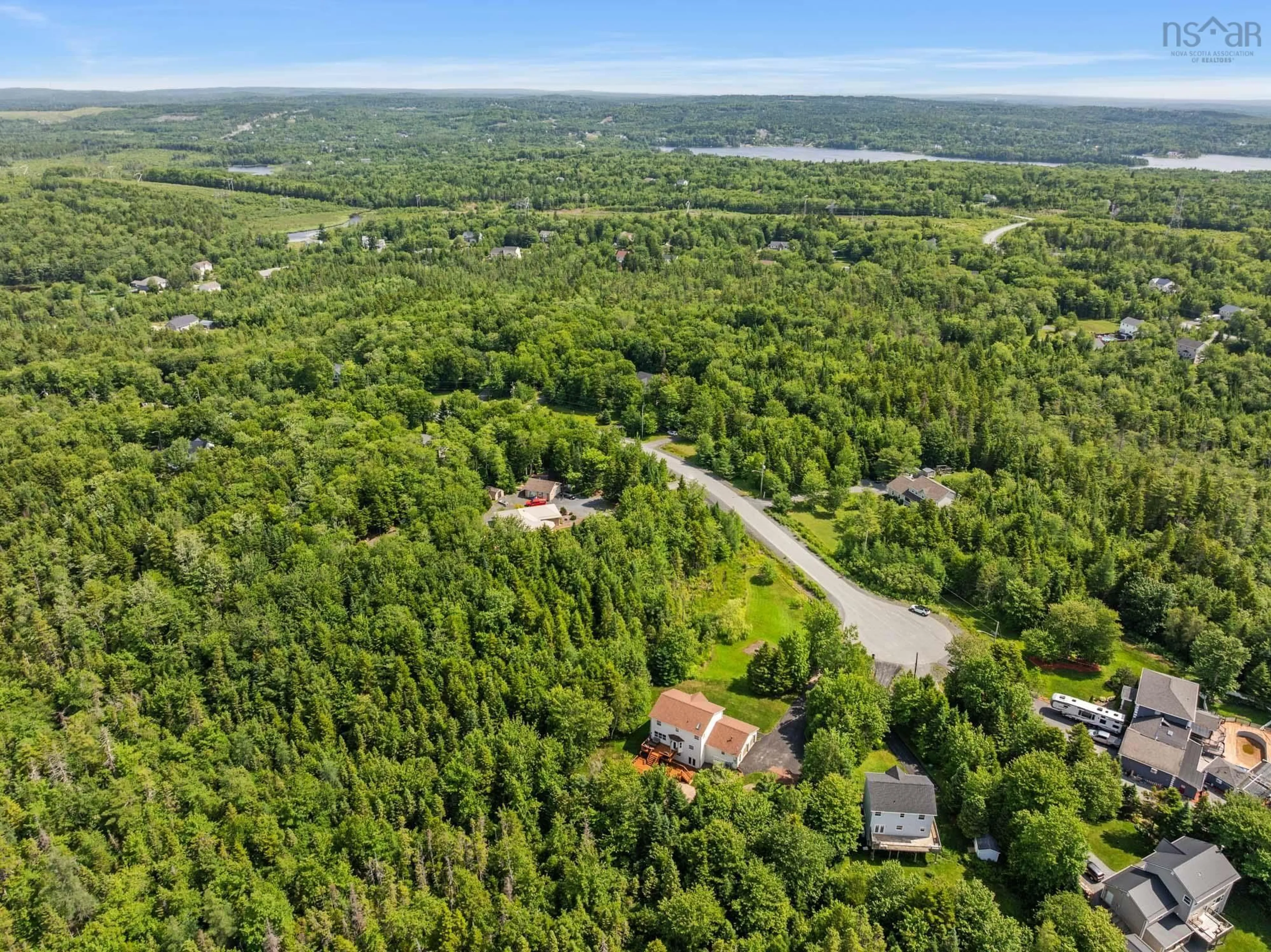 A pic from outside/outdoor area/front of a property/back of a property/a pic from drone, forest/trees view for 149 Canongate Dr, Hammonds Plains Nova Scotia B4B 1V5