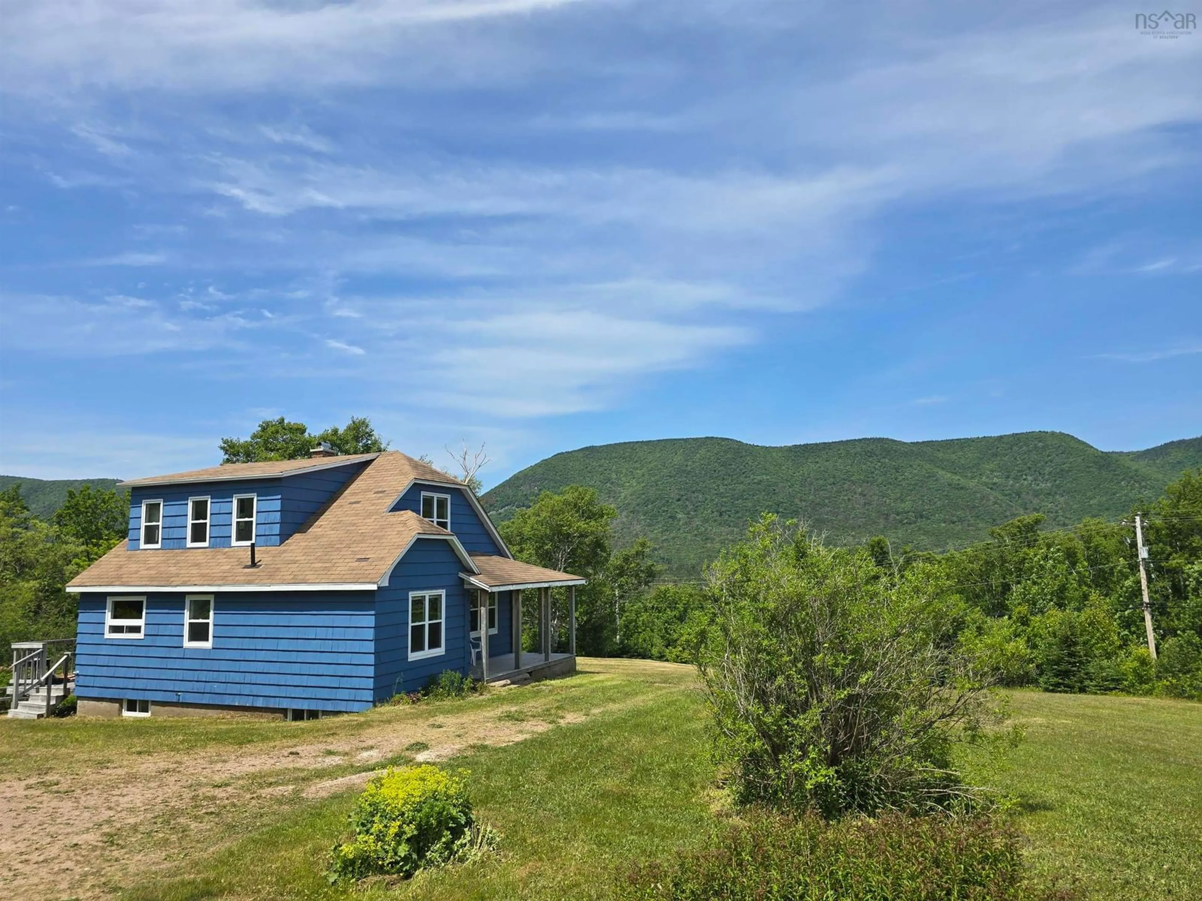 A pic from outside/outdoor area/front of a property/back of a property/a pic from drone, mountain view for 217 Bay St Lawrence Rd, Cape North Nova Scotia B0C 1G0