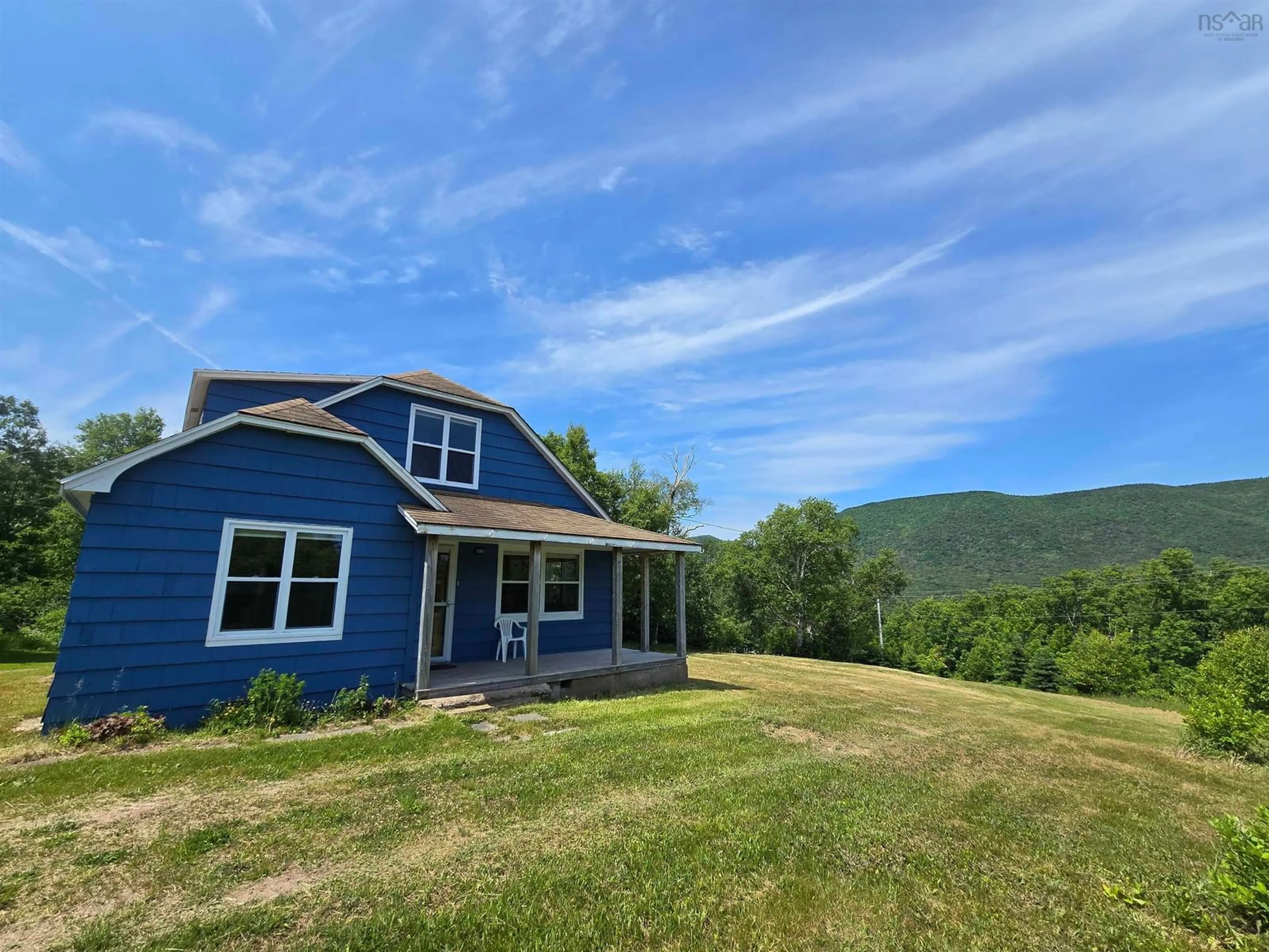 A pic from outside/outdoor area/front of a property/back of a property/a pic from drone, mountain view for 217 Bay St Lawrence Rd, Cape North Nova Scotia B0C 1G0