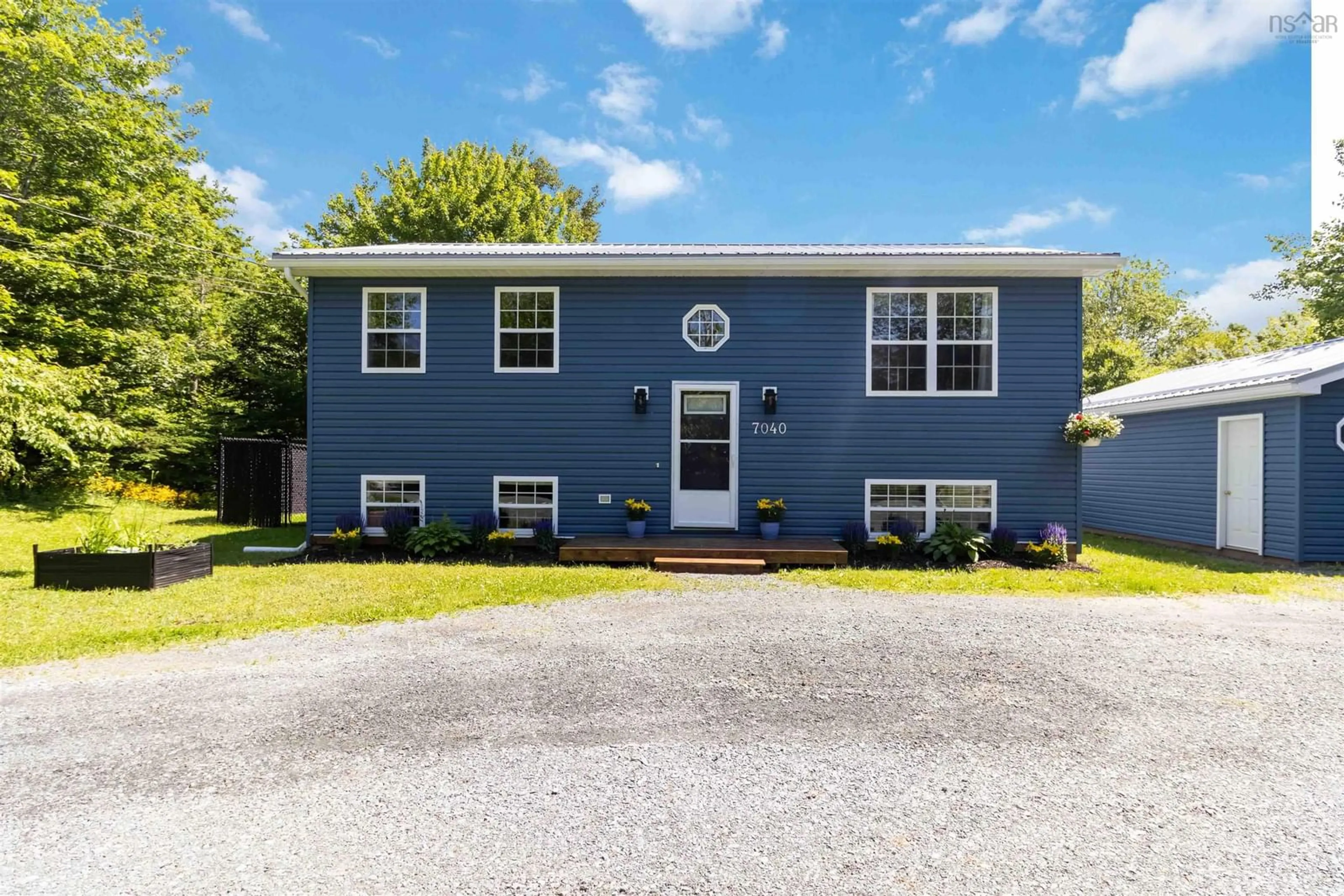 Home with vinyl exterior material, street for 7040 Highway 7, Gaetz Brook Nova Scotia B0J 1N0