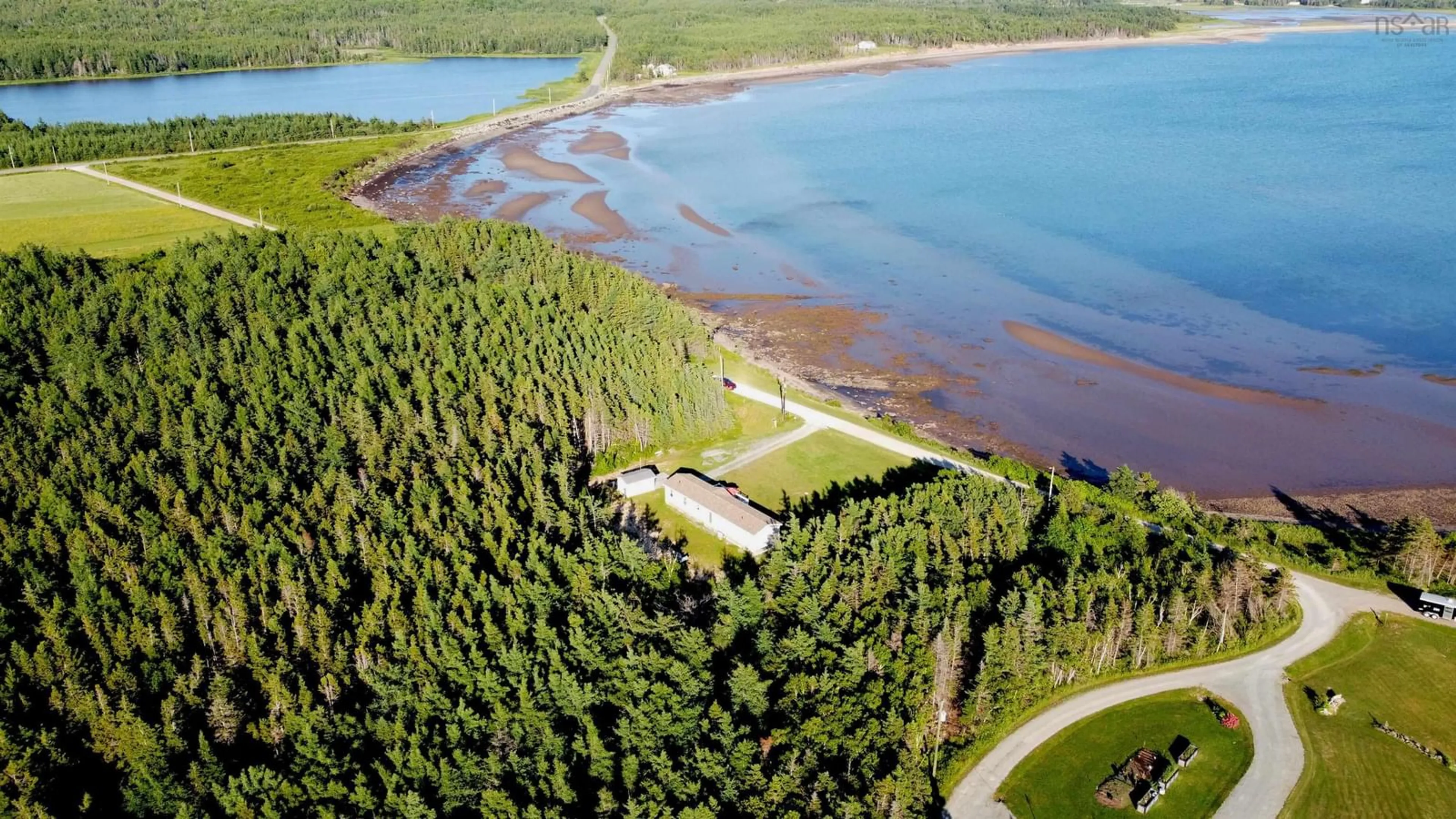 A pic from outside/outdoor area/front of a property/back of a property/a pic from drone, water/lake/river/ocean view for 80 Hideaway Dr, Judique North Nova Scotia B0E 1P0