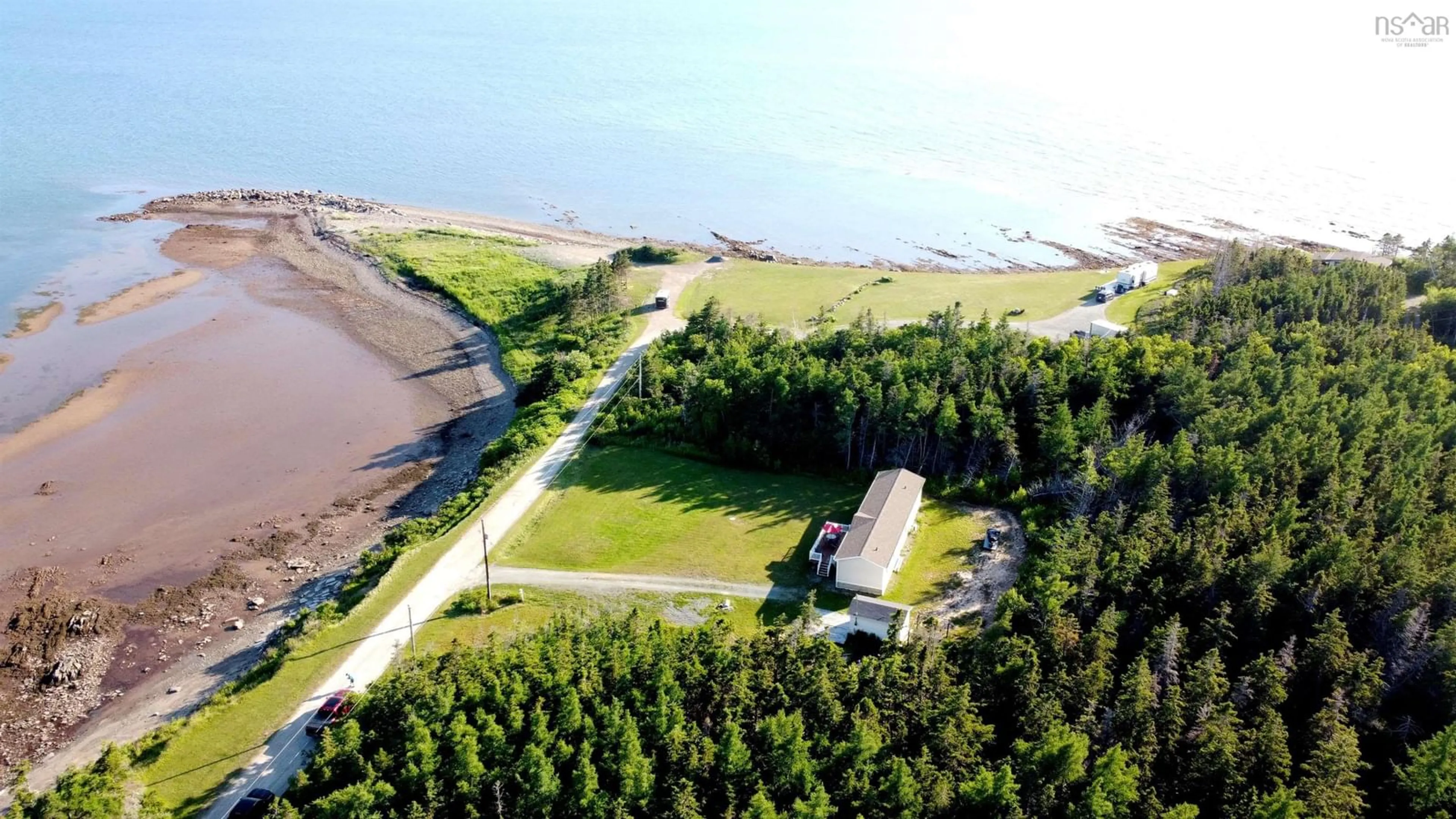 A pic from outside/outdoor area/front of a property/back of a property/a pic from drone, water/lake/river/ocean view for 80 Hideaway Dr, Judique North Nova Scotia B0E 1P0