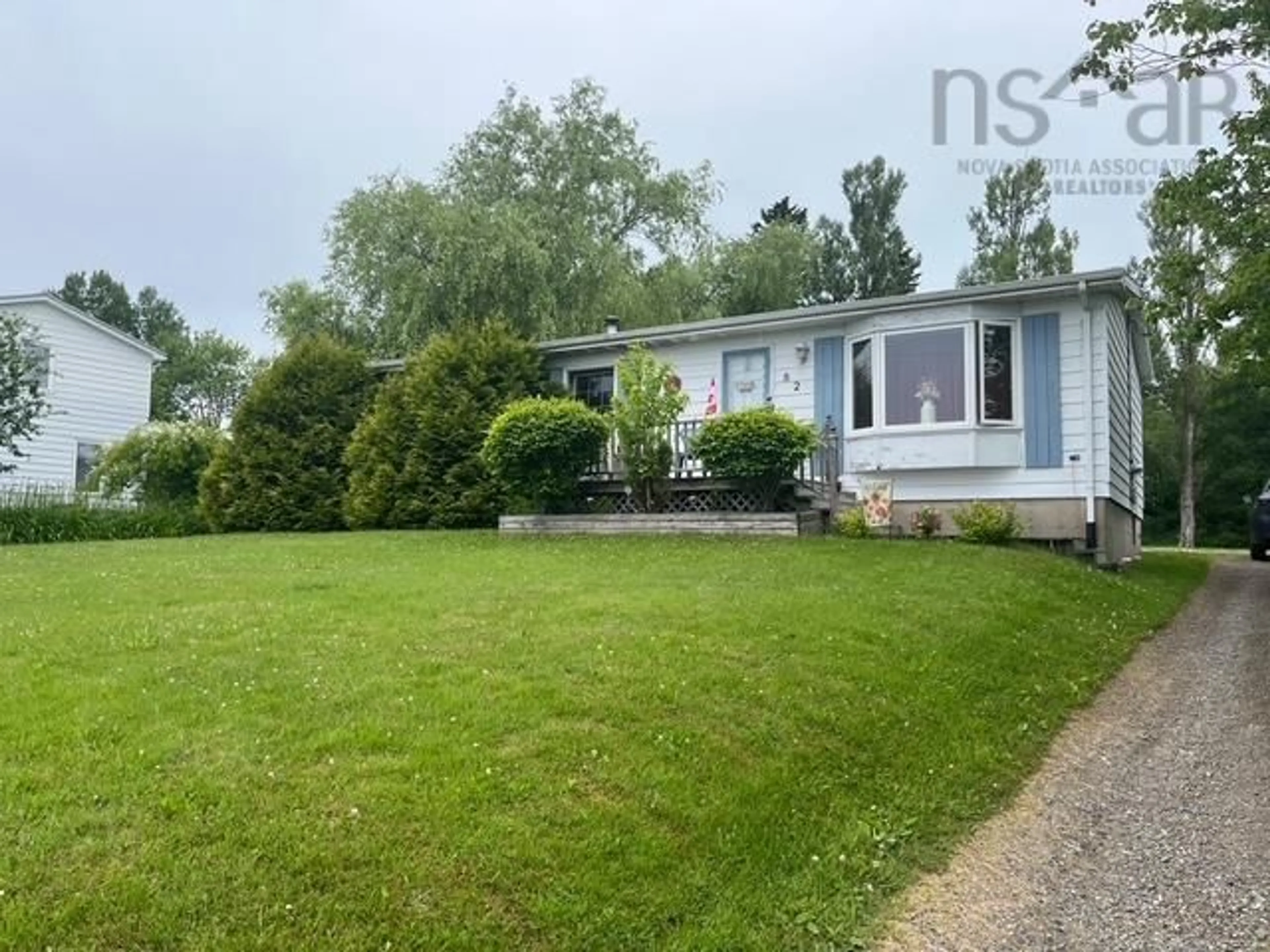 A pic from outside/outdoor area/front of a property/back of a property/a pic from drone, unknown for 82 High St, Baddeck Nova Scotia B0E 1B0